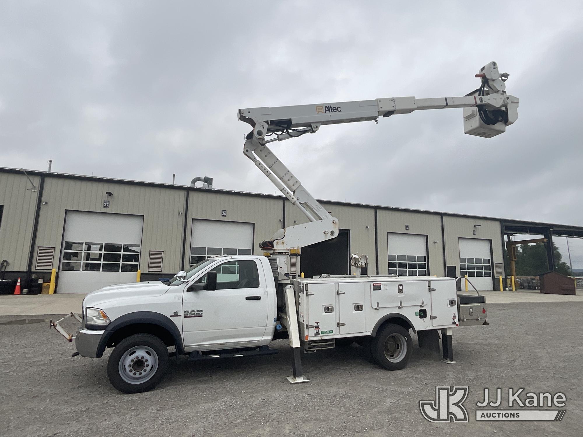 Altec AT40-MH, Articulating & Telescopic Material Handling Bucket Truck mounted behind cab on 2016 RAM 5500 4x4 Service Truck, Electric Cooperative Owned Unit