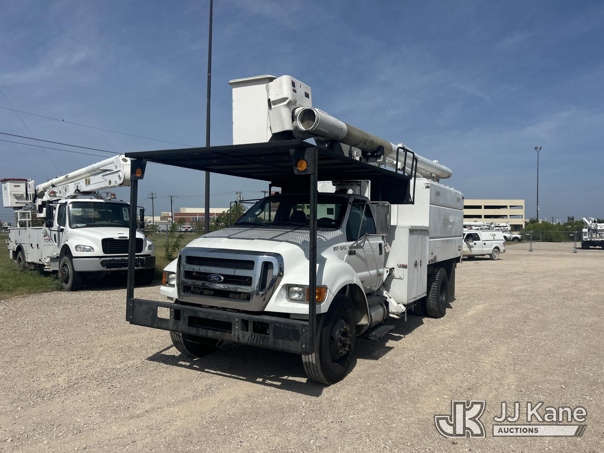 Altec LR756, Over-Center Bucket Truck mounted behind cab on 2015 Ford F-750 Chipper Dump Truck