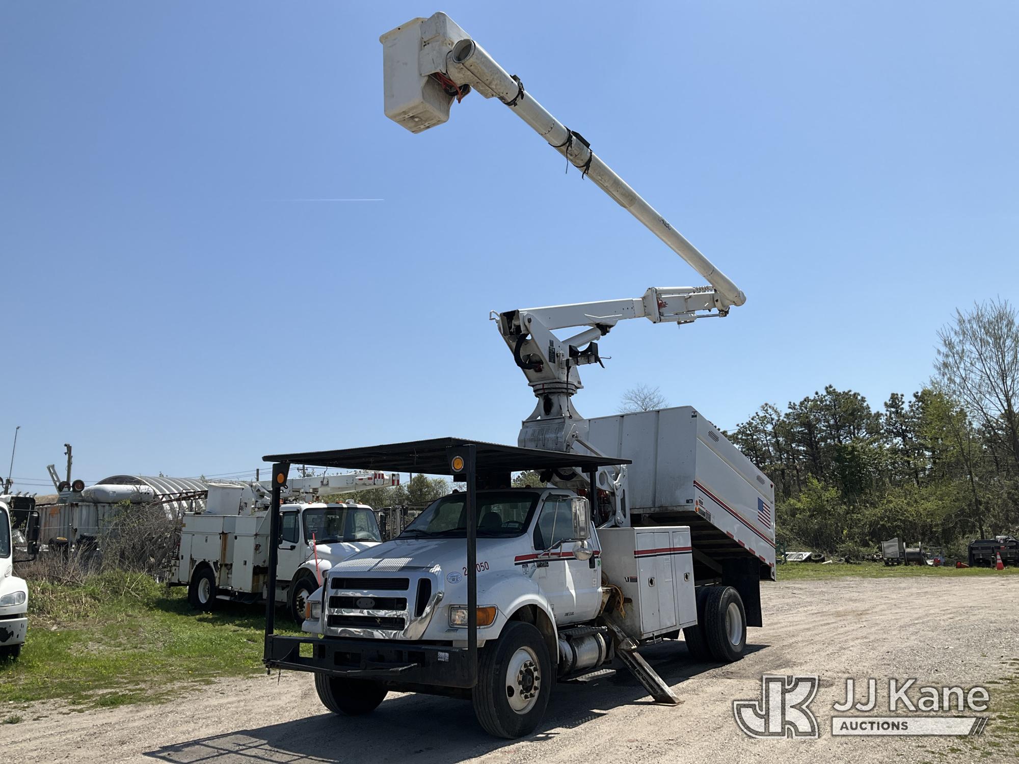 Altec LR760-E70, Over-Center Elevator Bucket Truck mounted behind cab on 2015 Ford F750 Chipper Dump Truck