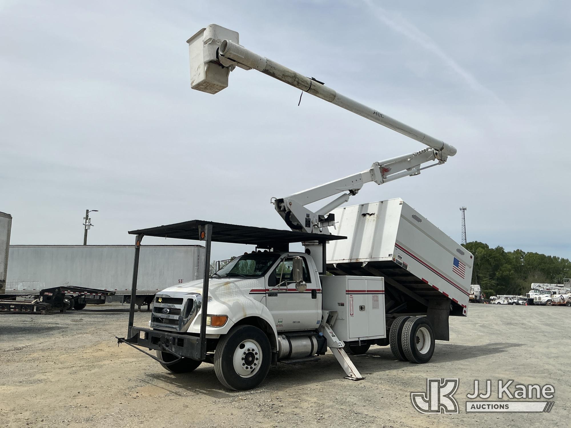 Altec LR756, Over-Center Bucket Truck mounted behind cab on 2015 Ford F-750 Chipper Dump Truck