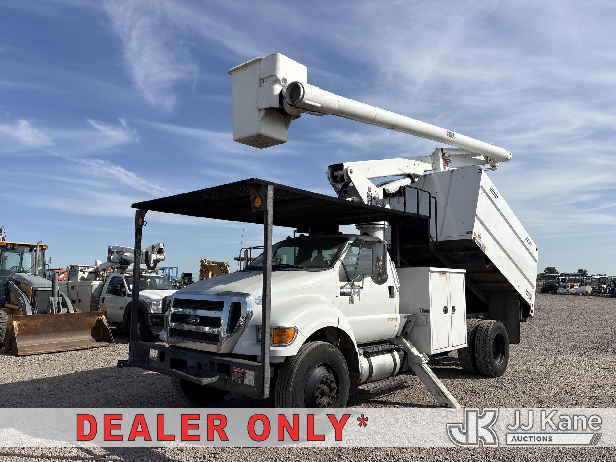 Altec LR756, Bucket Truck mounted behind cab on 2013 Ford F-750 Regular Cab 2WD DRW Chipper Dump Truck