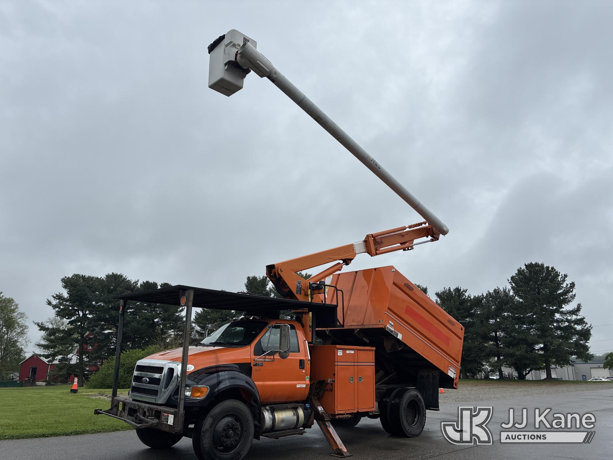 Altec LR756, Over-Center Bucket Truck mounted behind cab on 2015 Ford F-750 Chipper Dump Truck