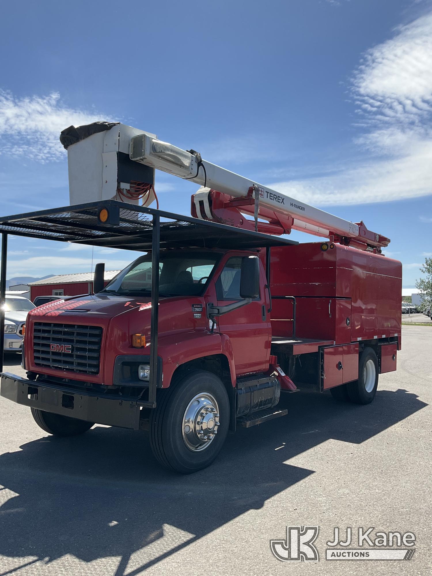 HiRanger XT55, Over-Center Bucket Truck mounted behind cab on 2006 GMC TopKick C7500 Chipper Dump Truck