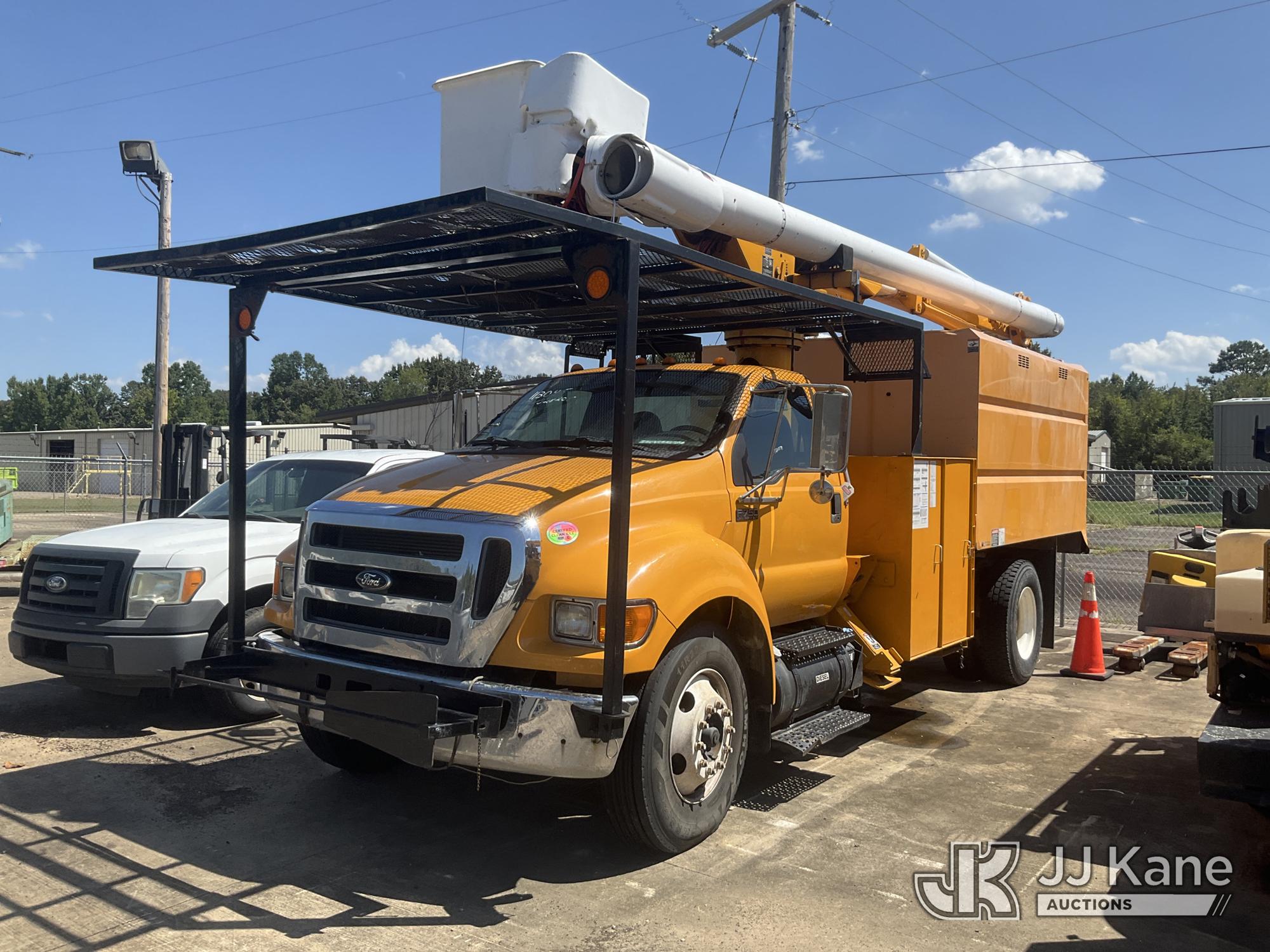 Altec LR756, Over-Center Bucket Truck mounted behind cab on 2013 Ford F-750 Chipper Dump Truck