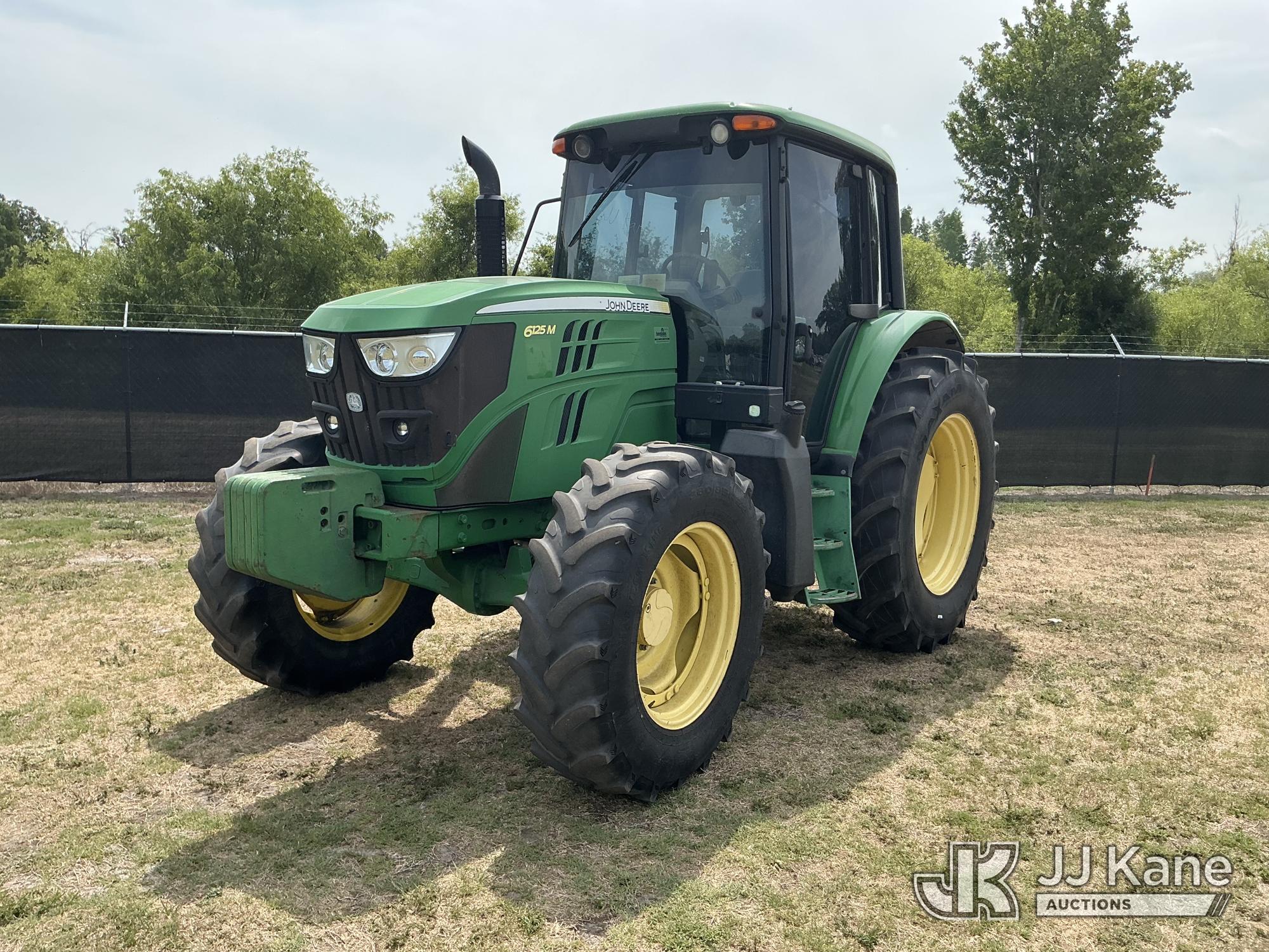 Photo of a 2014 John Deere 6125M MFWD