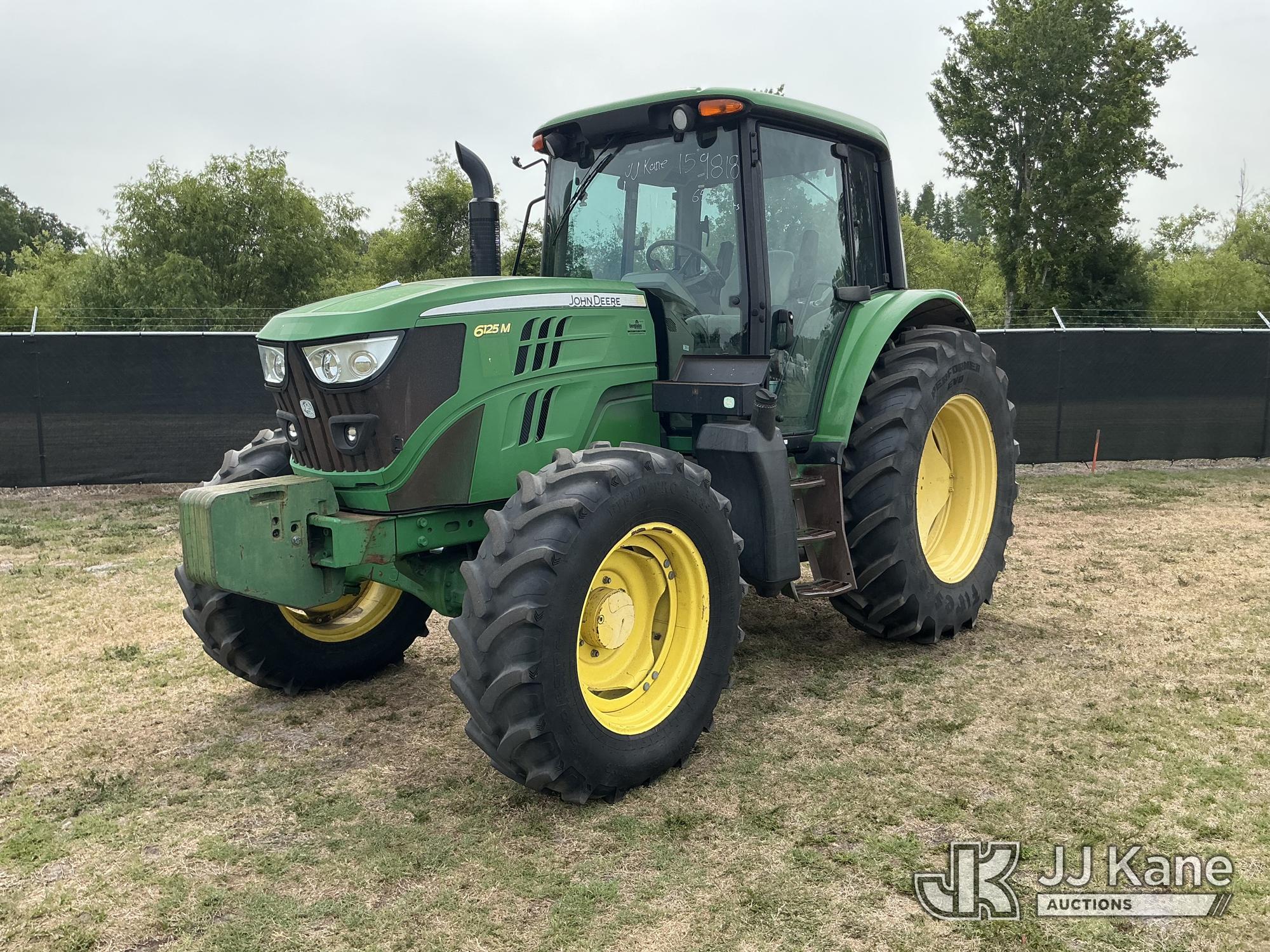 Photo of a 2014 John Deere 6125M MFWD