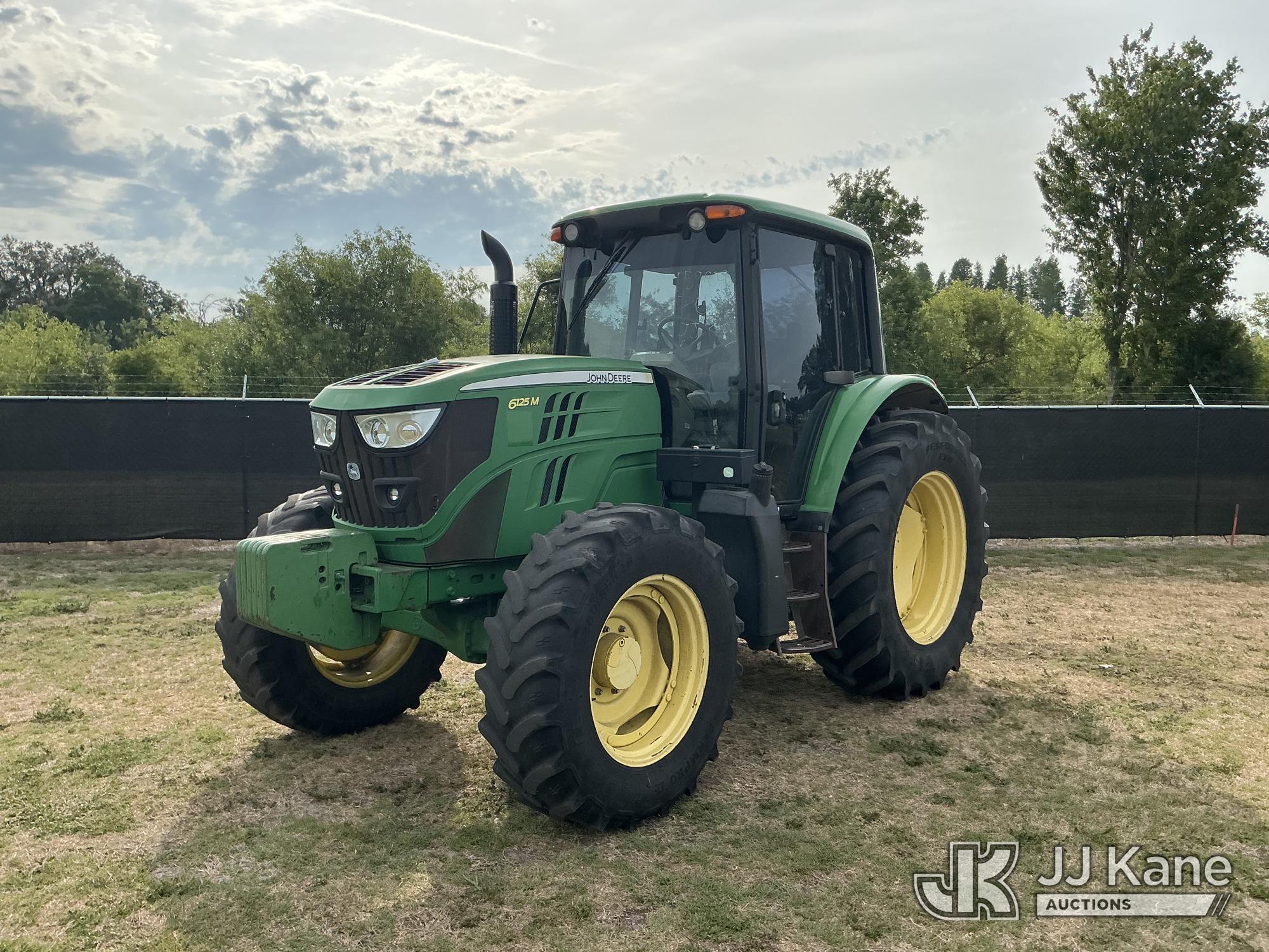 Photo of a 2014 John Deere 6125M MFWD