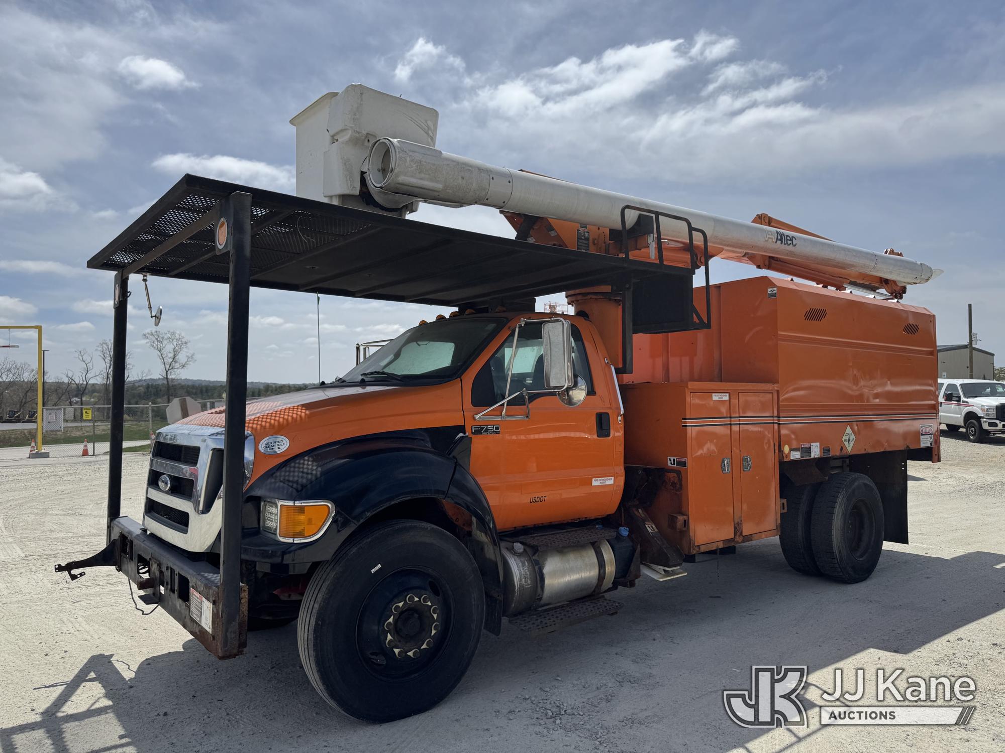 Altec LR756, Over-Center Bucket Truck mounted behind cab on 2013 Ford F-750 Chipper Dump Truck