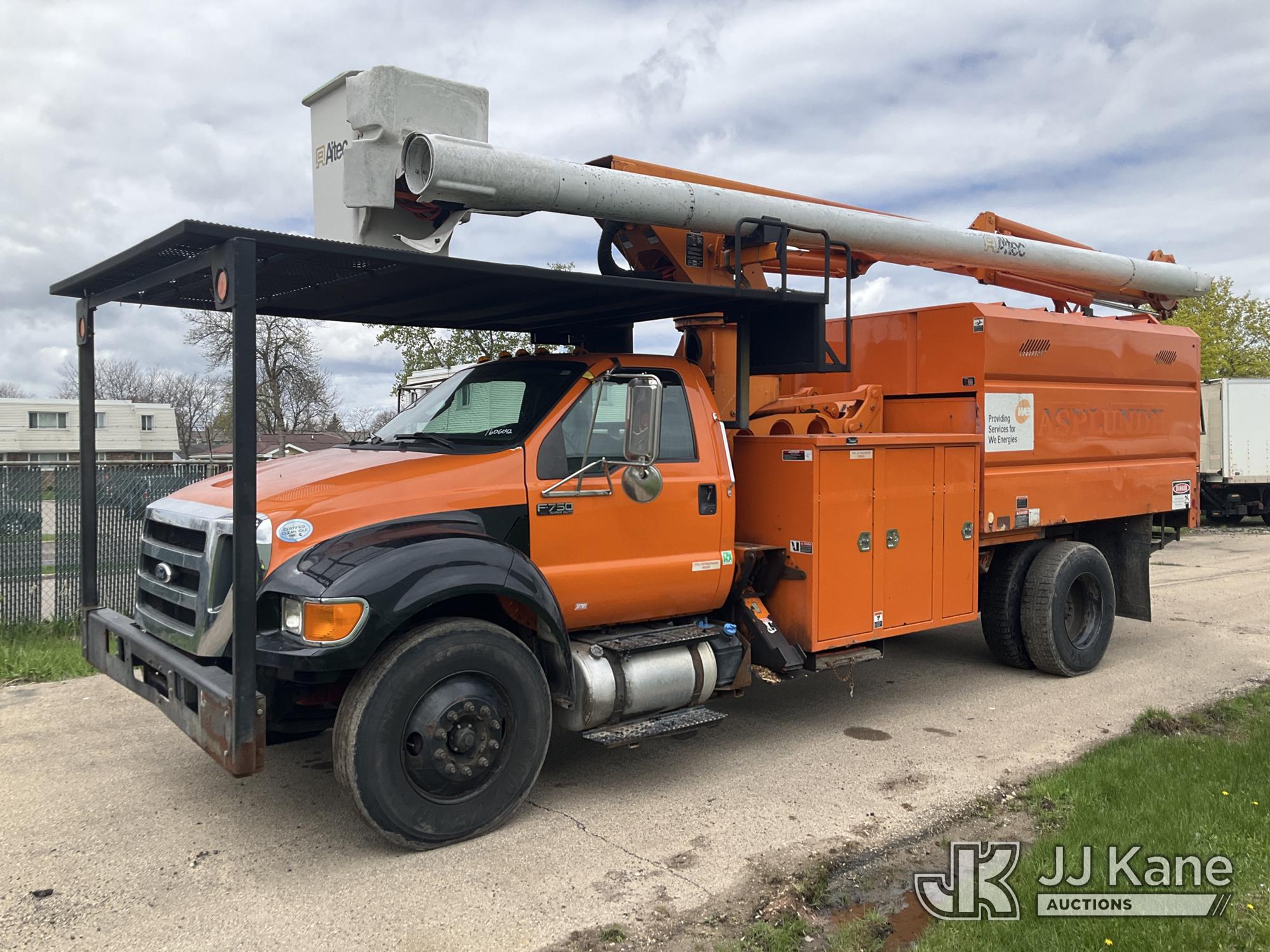 Altec LR760E70, Over-Center Elevator Bucket Truck mounted behind cab on 2013 Ford F-750 Chipper Dump Truck