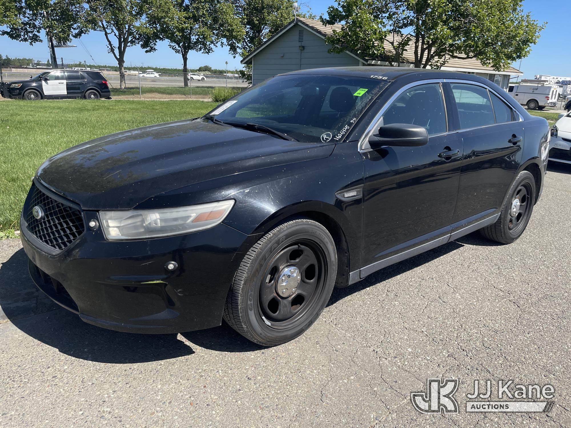 2014 Ford Taurus Police AWD 4-Door Sedan, Manufacturer Recall Number 20S04 - VEHICLES THAT ARE EXPOSED TO FREQUENT FULL REAR SUSPENSION ARTICULATION (JOUNCE AND REBOUND) MAY EXPERIENCE A FRACTURED REAR SUSPENSION TOE LINK.