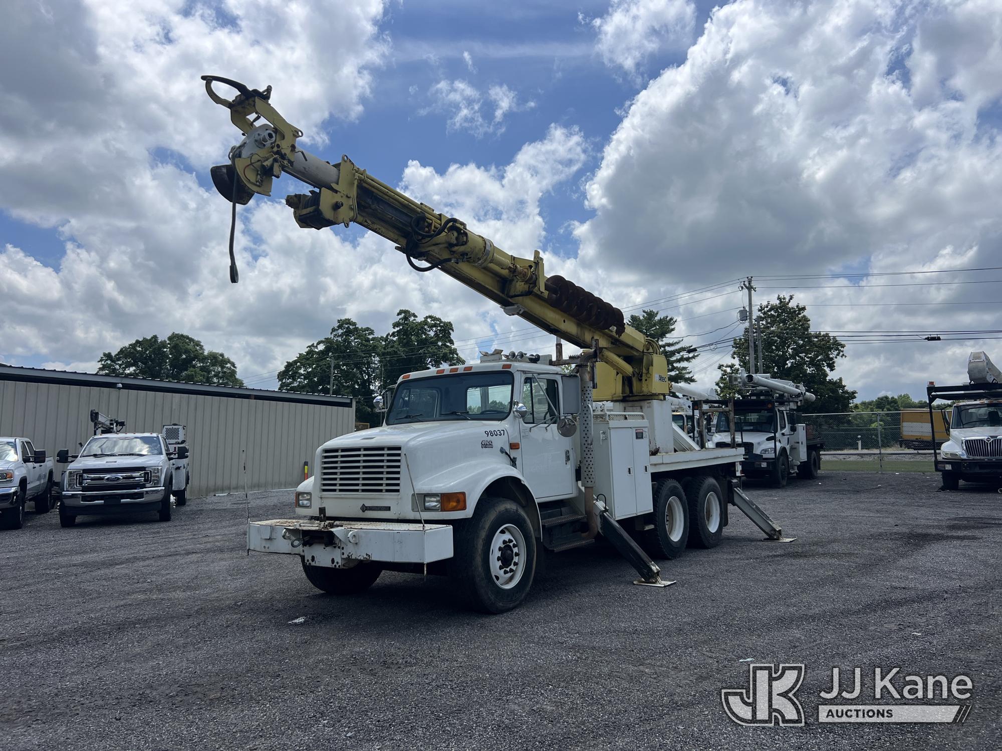 Altec D947-BR, Digger Derrick rear mounted on 1998 International 4700 T/A Flatbed/Utility Truck