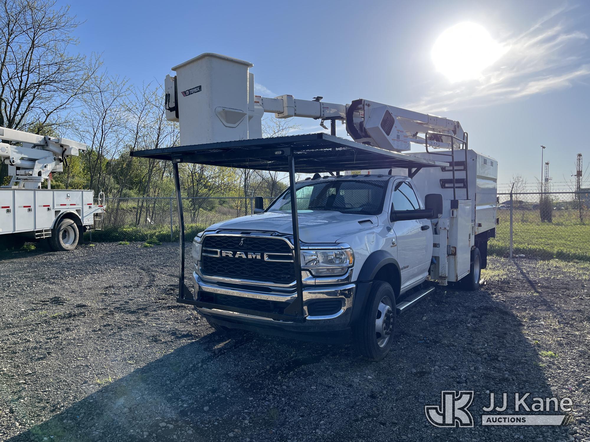 Terex -, Articulating & Telescopic Bucket mounted behind cab on 2019 Ram 5500 4x4 Chipper Dump Truck