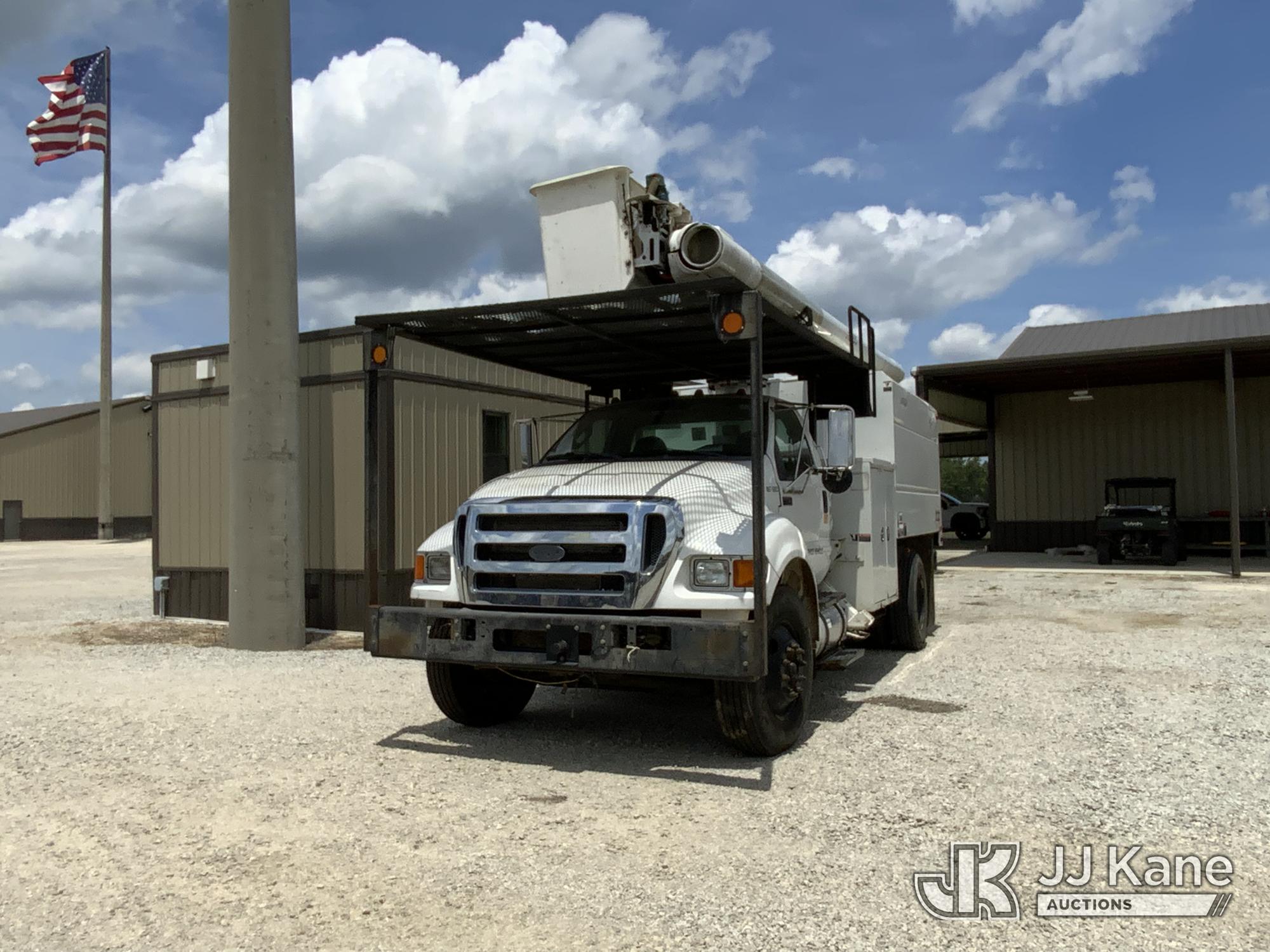 Altec LR756, Over-Center Bucket Truck mounted behind cab on 2015 Ford F-750 Chipper Dump Truck