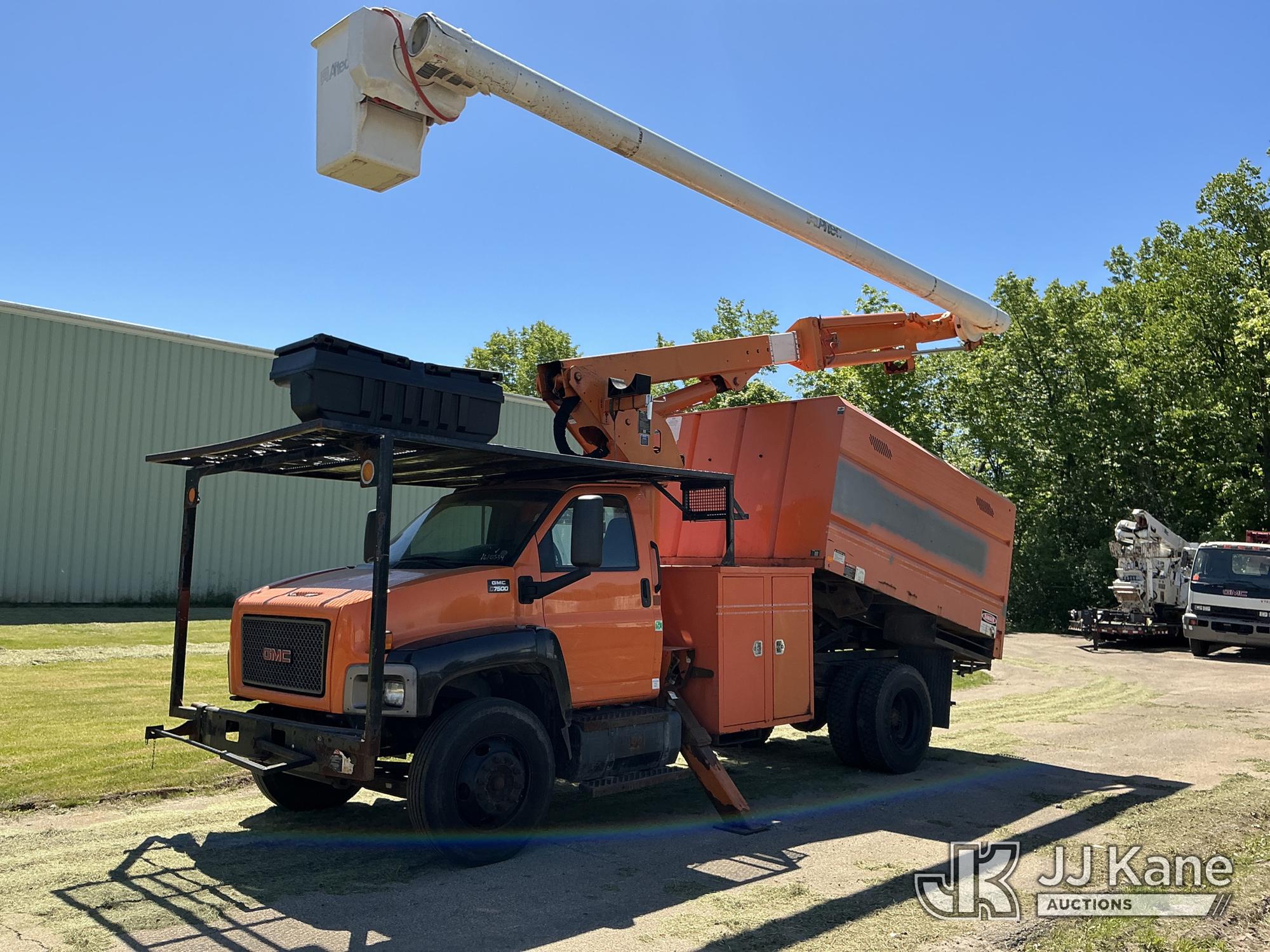 Altec LRV55, Over-Center Elevator Bucket mounted behind cab on 2008 GMC C7500 Chipper Dump Truck