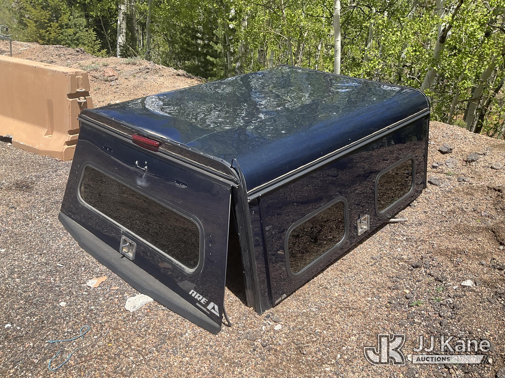 A.R.E. Truck bed cover/topper - fits 2017 F-250 pickup truck ((Hail Damage)) NOTE: This unit is being sold AS IS/WHERE IS via Timed Auction and is located in Colorado Springs