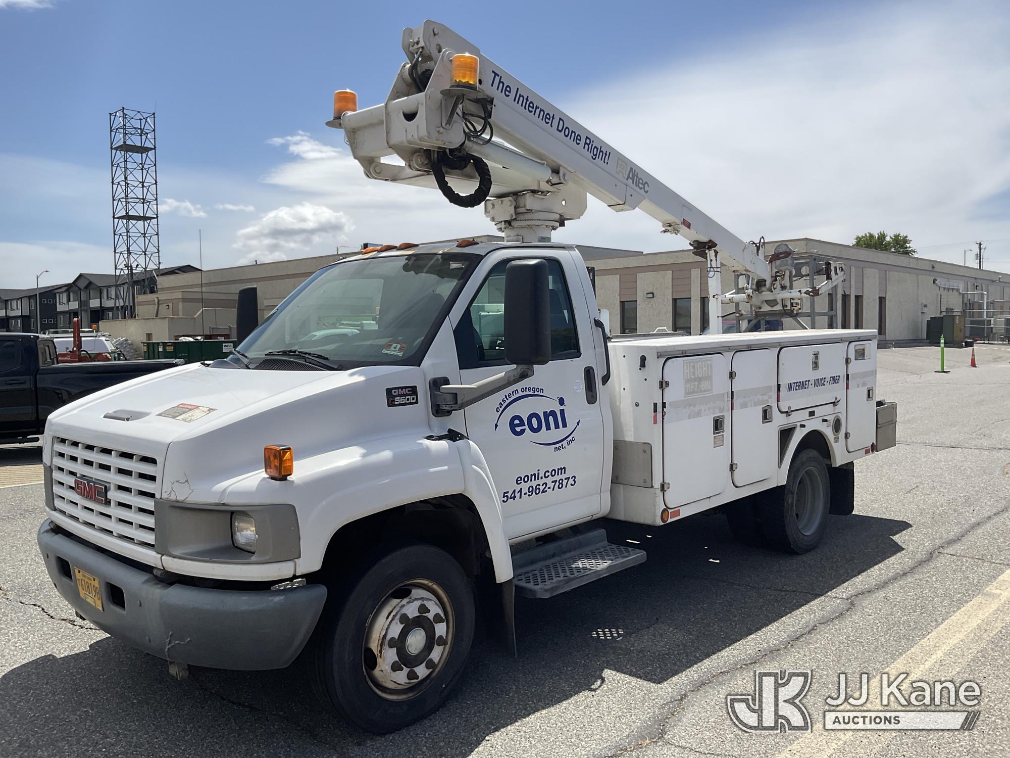 Altec AT235-P, Articulating & Telescopic Non-Insulated Cable Placing Bucket Truck mounted behind cab on 2006 GMC C5500 Utility Truck