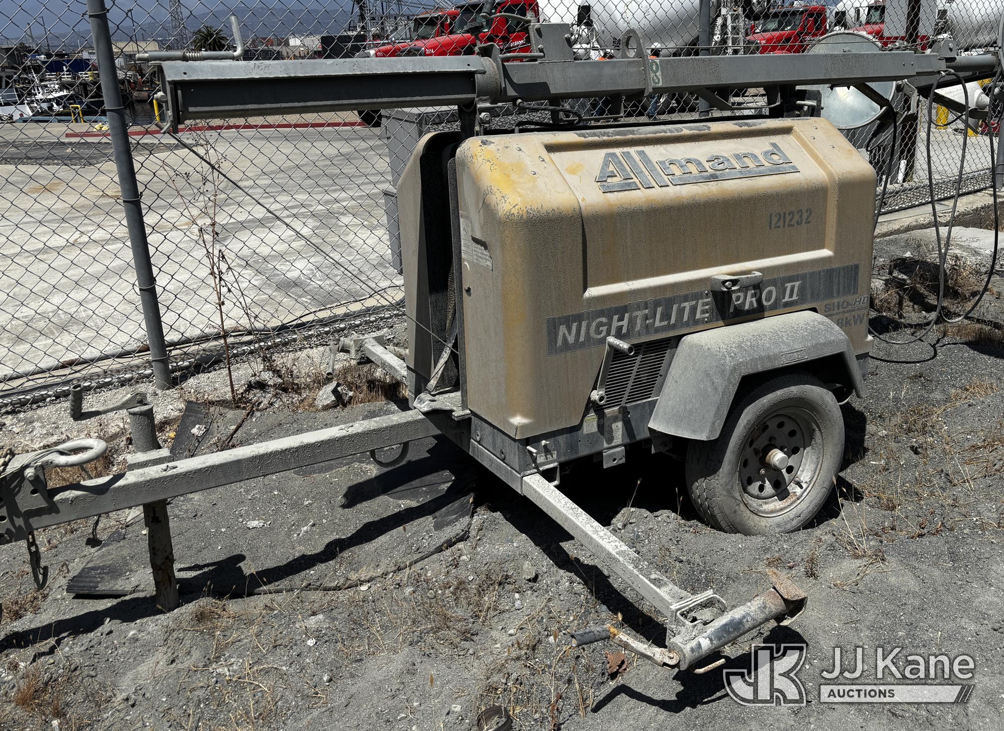 Allmand Bros., Inc. Night-Lite Pro II Allmand Night-Lite Pro II portable diesel light tower with telescoping mast and four floodlights. Unit is equipped with diesel engine, generator package, power receptacles, stabilizer outriggers, and trailer-mounted transport frame.