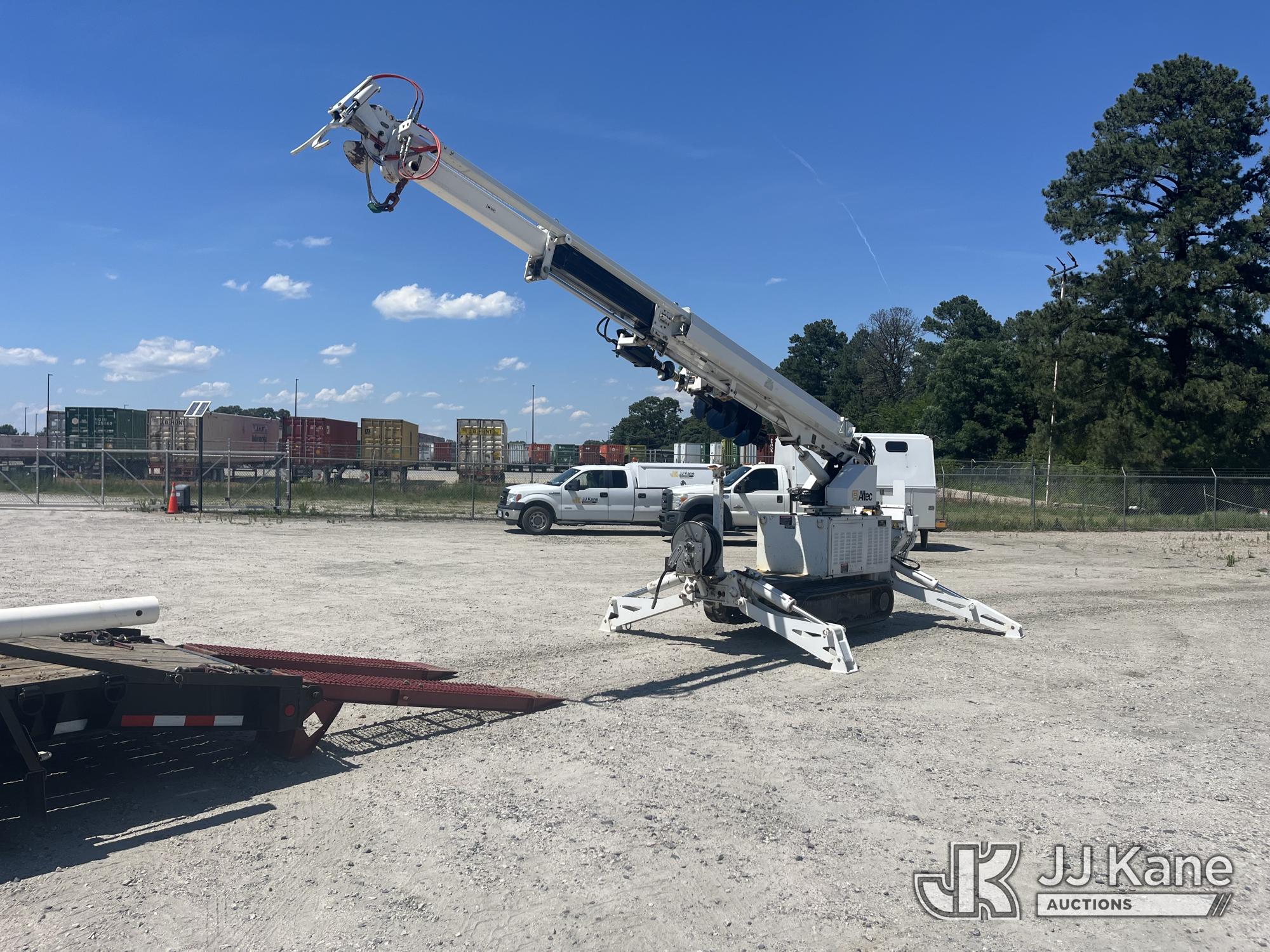 Altec DB37, Back Yard Digger Derrick mounted on 2017 Mcelroy Tracked Back Yard Carrier
