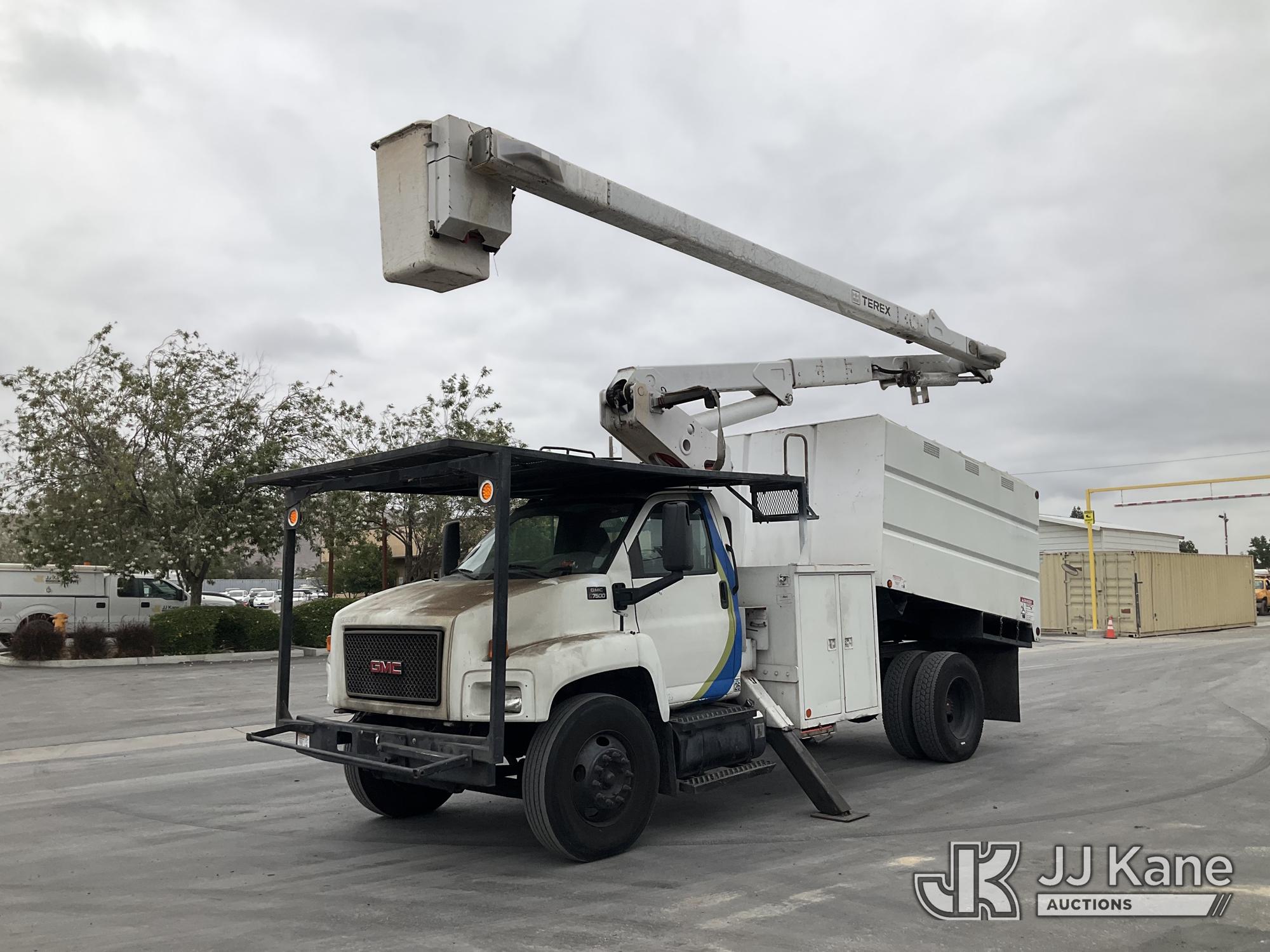 HiRanger XT-55, Over-Center Bucket Truck mounted behind cab on 2008 GMC Topkick Chipper Dump Truck