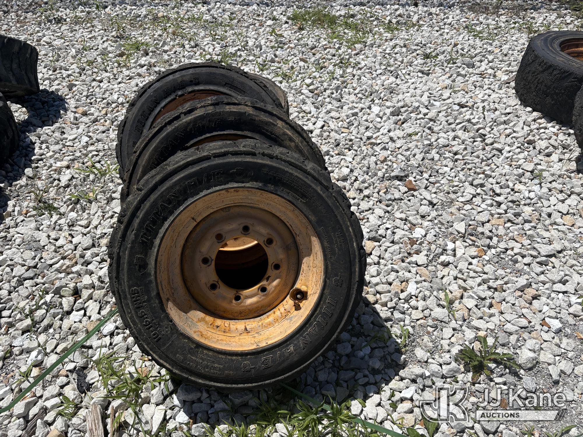(4) foam filled tires and steel wheels 10-16.5 tire size. (Used) (Seller States: Need Recapped) NOTE: This unit is being sold AS IS/WHERE IS via Timed Auction and is located in Hawk Point