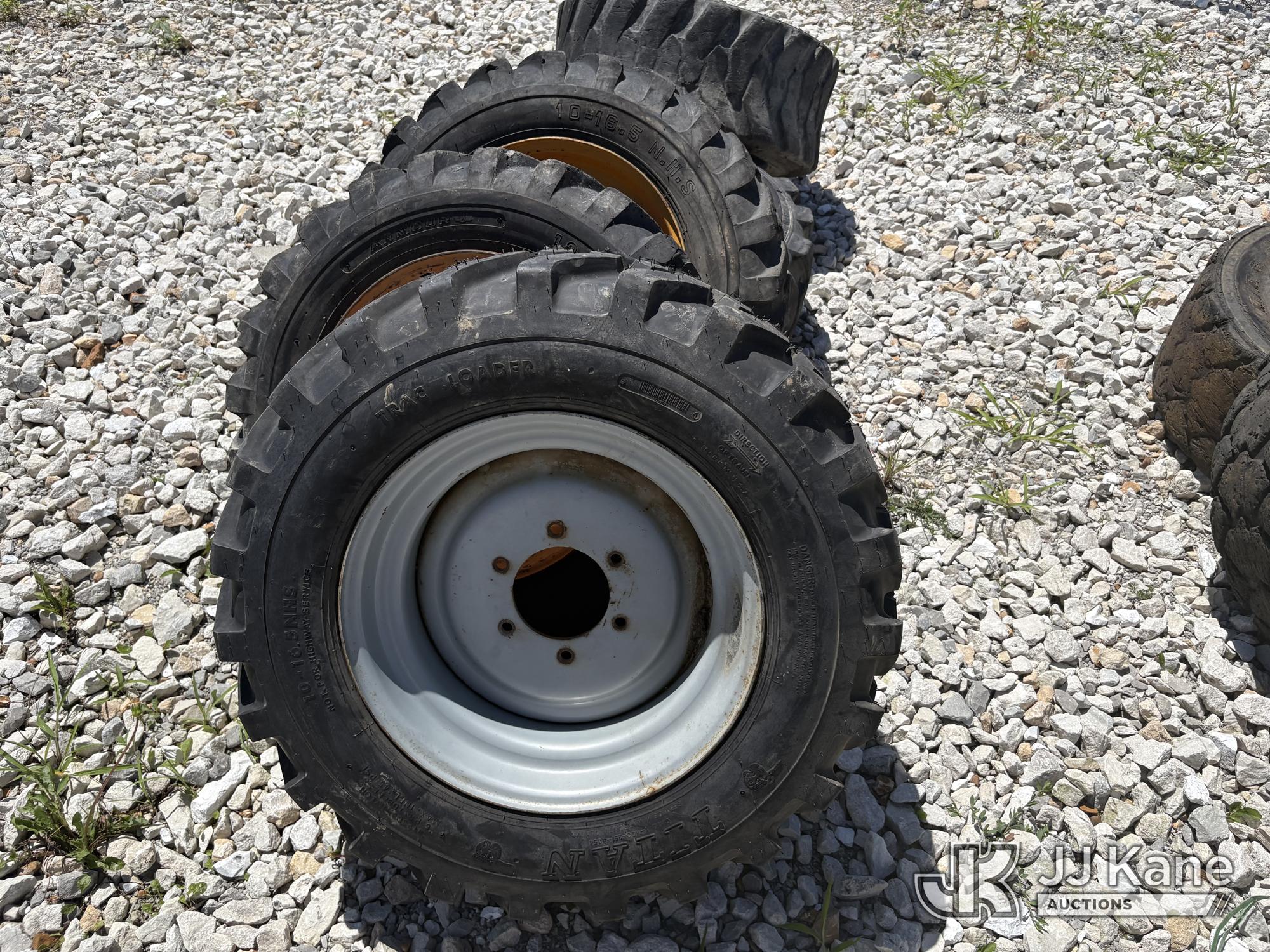 (4) tires and steel wheels 10-16.5 tire size. One tire. (Used) (Seller States: Need Recapped) NOTE: This unit is being sold AS IS/WHERE IS via Timed Auction and is located in Hawk Point