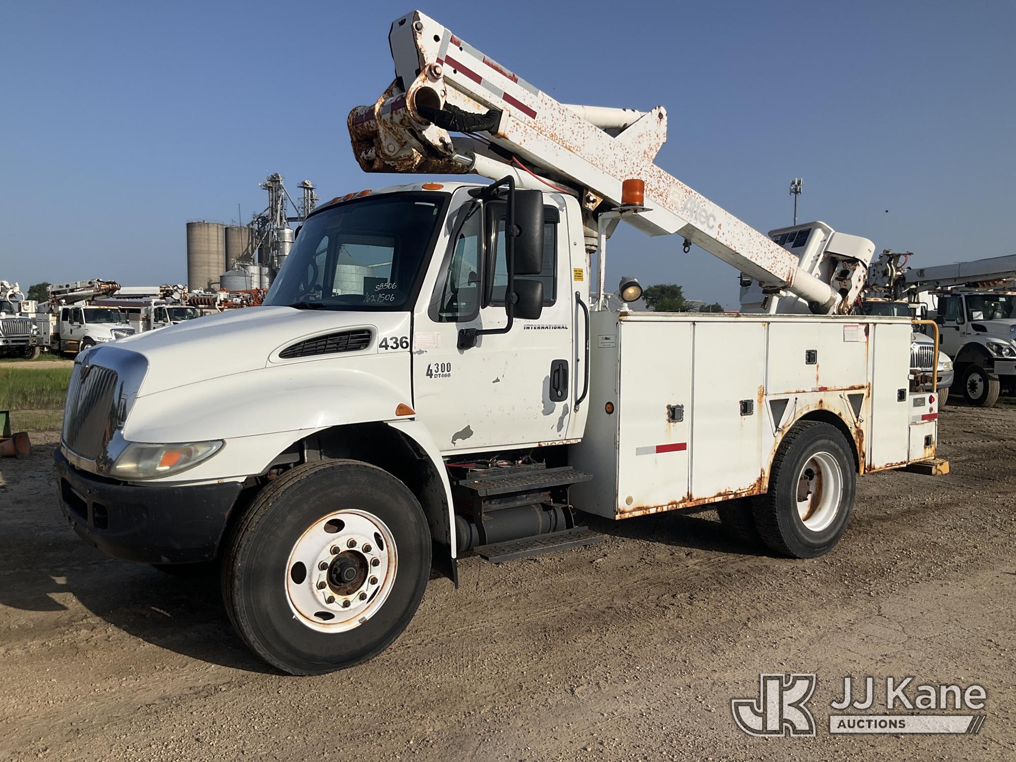 Altec TA40, Articulating & Telescopic Bucket Truck mounted behind cab on 2004 International 4300 Utility Truck