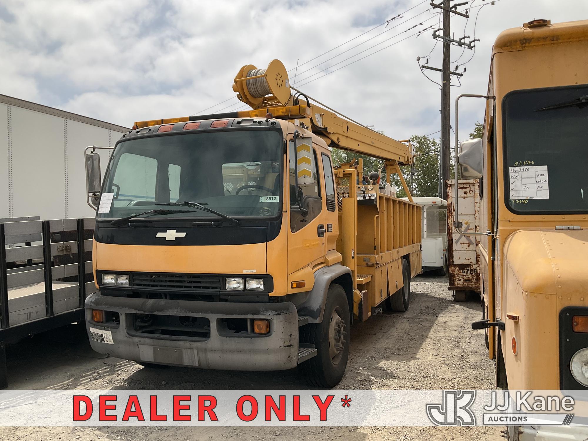 Altec D848A T, Hydraulic Crane mounted behind cab on 2002 Chevrolet F7B042 Flatbed/Utility Truck