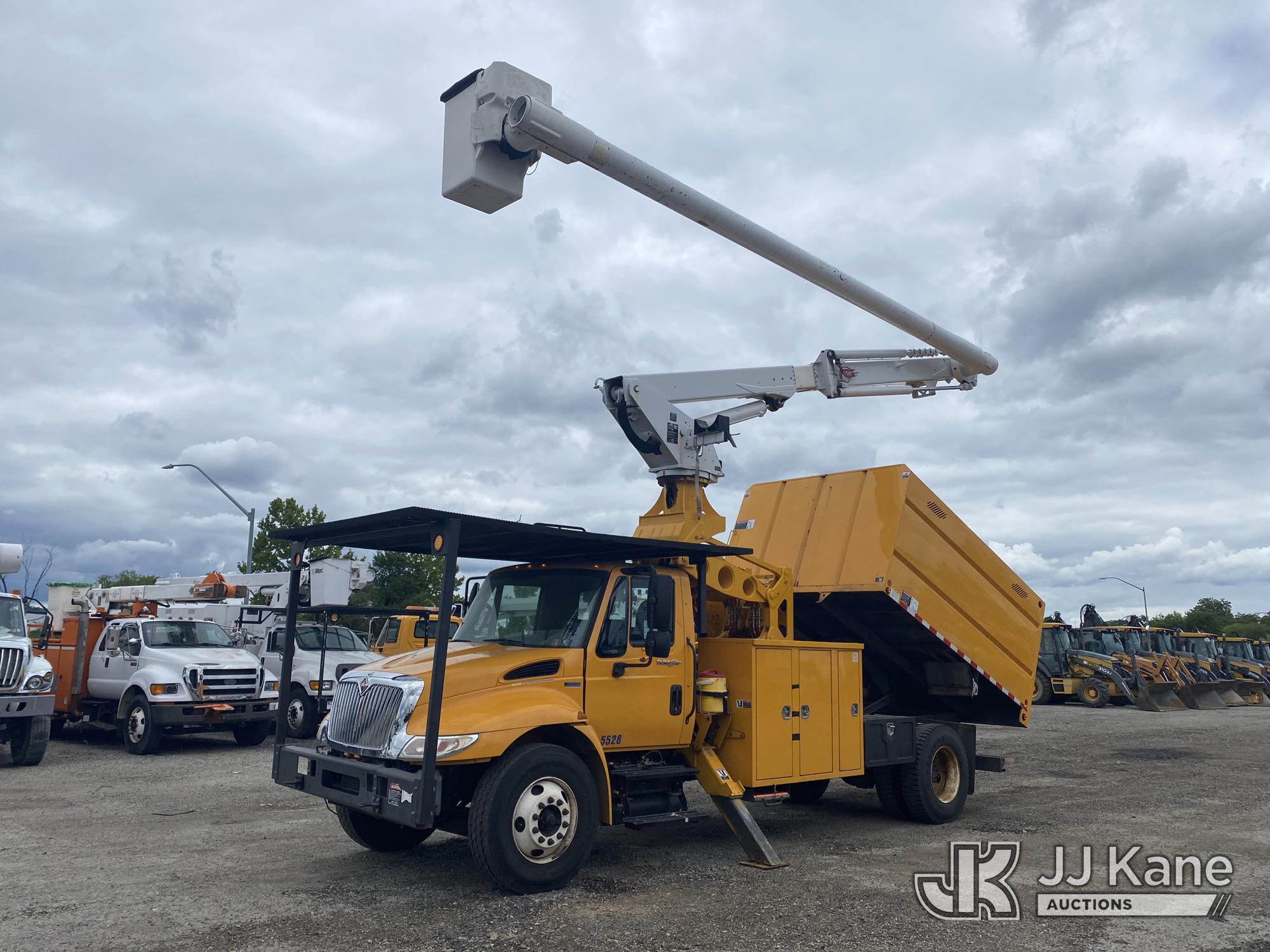 Altec LR756-E66, Over-Center Elevator Bucket Truck mounted behind cab on 2014 International DuraStar 4300 Chipper Dump Truck