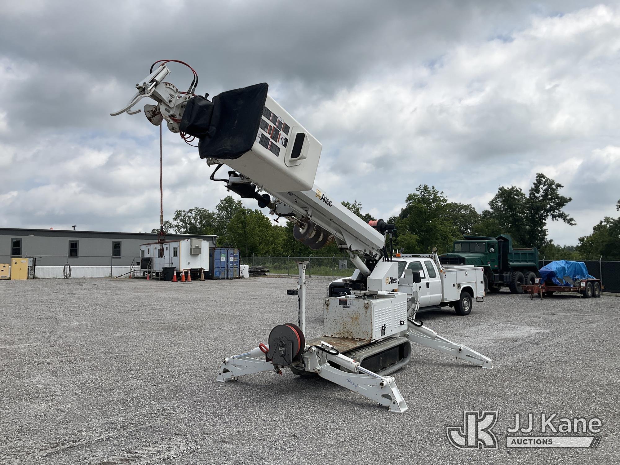 Altec DB37, Back Yard Digger Derrick mounted on 2013 Altec Tracked Back Yard Carrier, To Be Sold With Lot# V320T (Equipment and trailer price will be split out on invoice to reflect 80/20, equipment to trailer price ratio for tax purposes)