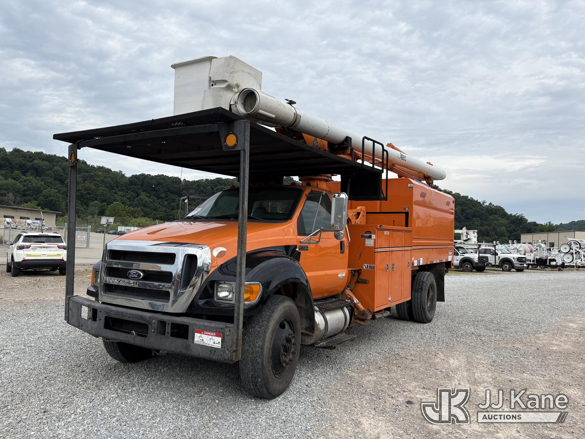 Altec LR760E70, Over-Center Elevator Bucket Truck mounted behind cab on 2013 Ford F750 Chipper Dump Truck