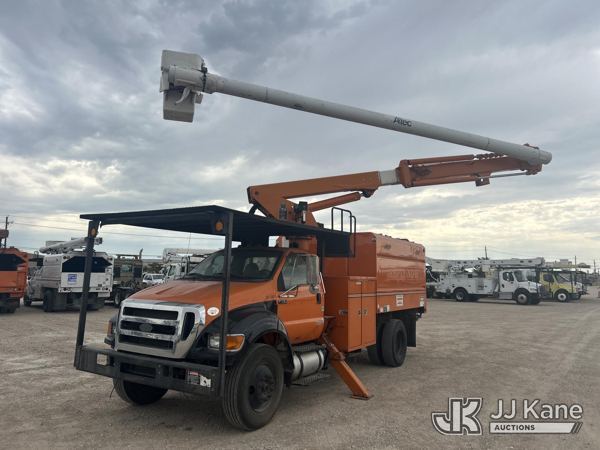 Altec LR756, Over-Center Bucket Truck mounted behind cab on 2013 Ford F-750 Chipper Dump Truck