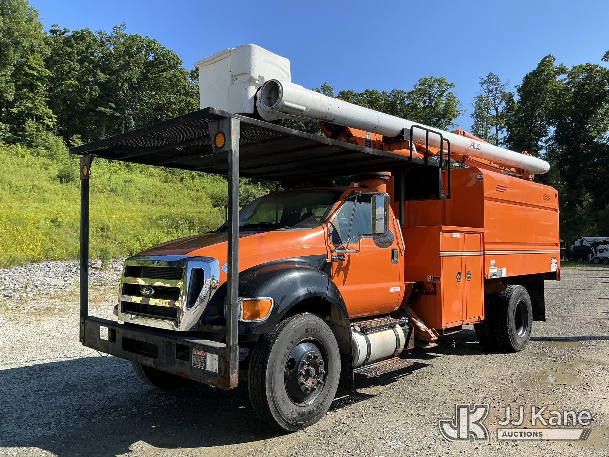 Altec LR756, Over-Center Bucket Truck mounted behind cab on 2015 Ford F-750 Chipper Dump Truck