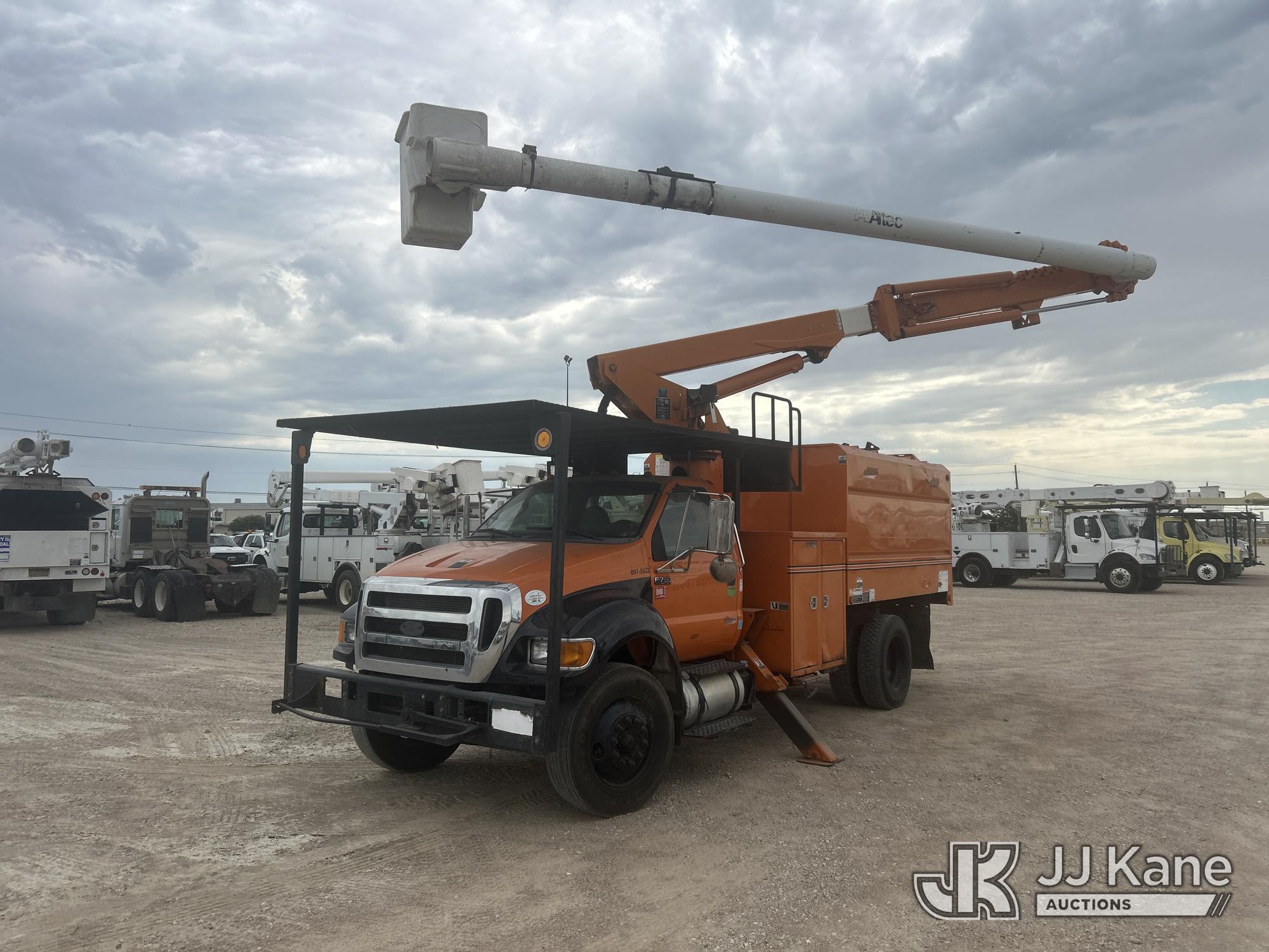 Altec LR756, Over-Center Bucket Truck mounted behind cab on 2015 Ford F-750 Chipper Dump Truck