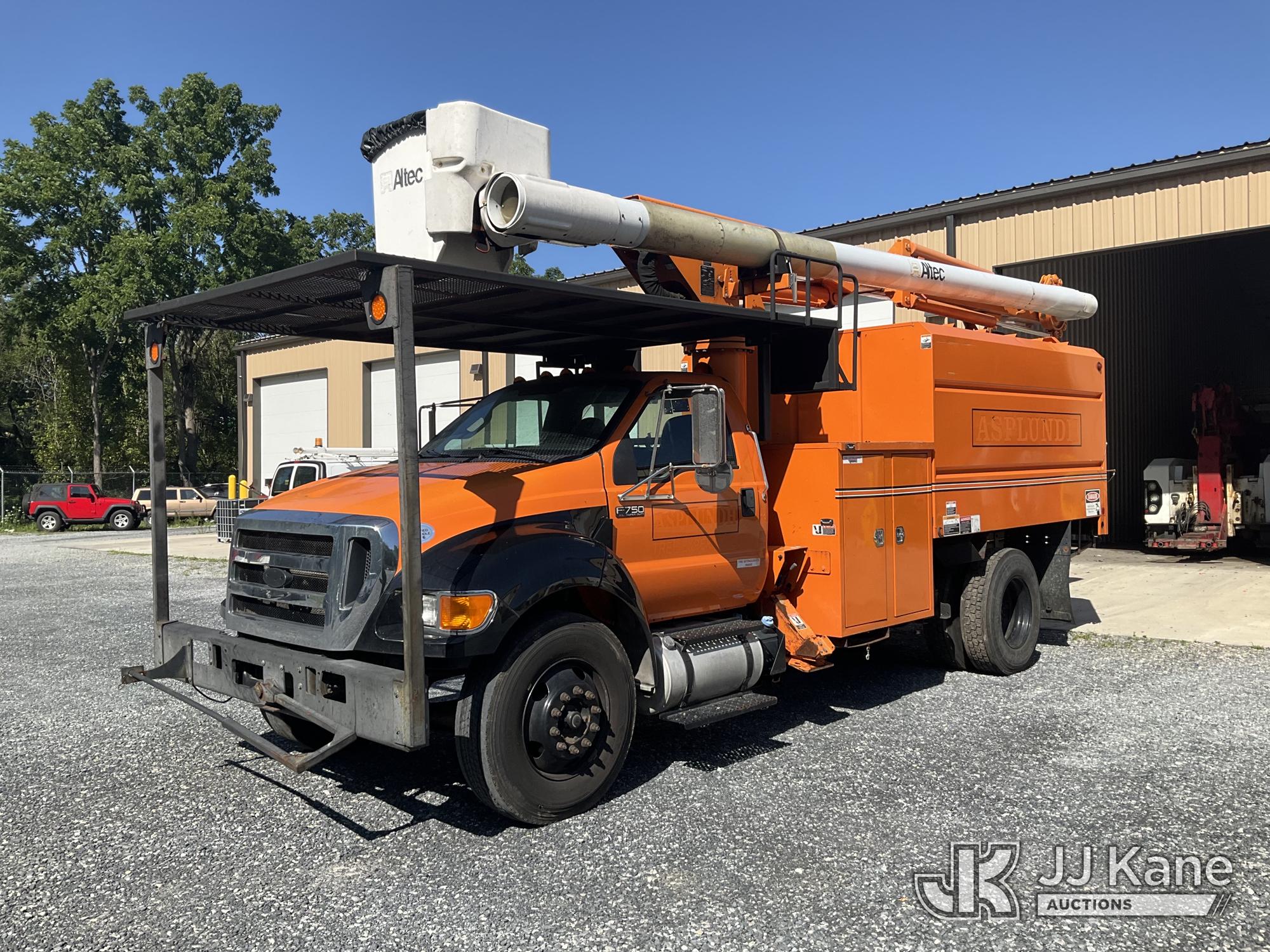 Altec LR756, Over-Center Bucket Truck mounted behind cab on 2015 Ford F-750 Regular Cab DRW Chipper Dump Truck
