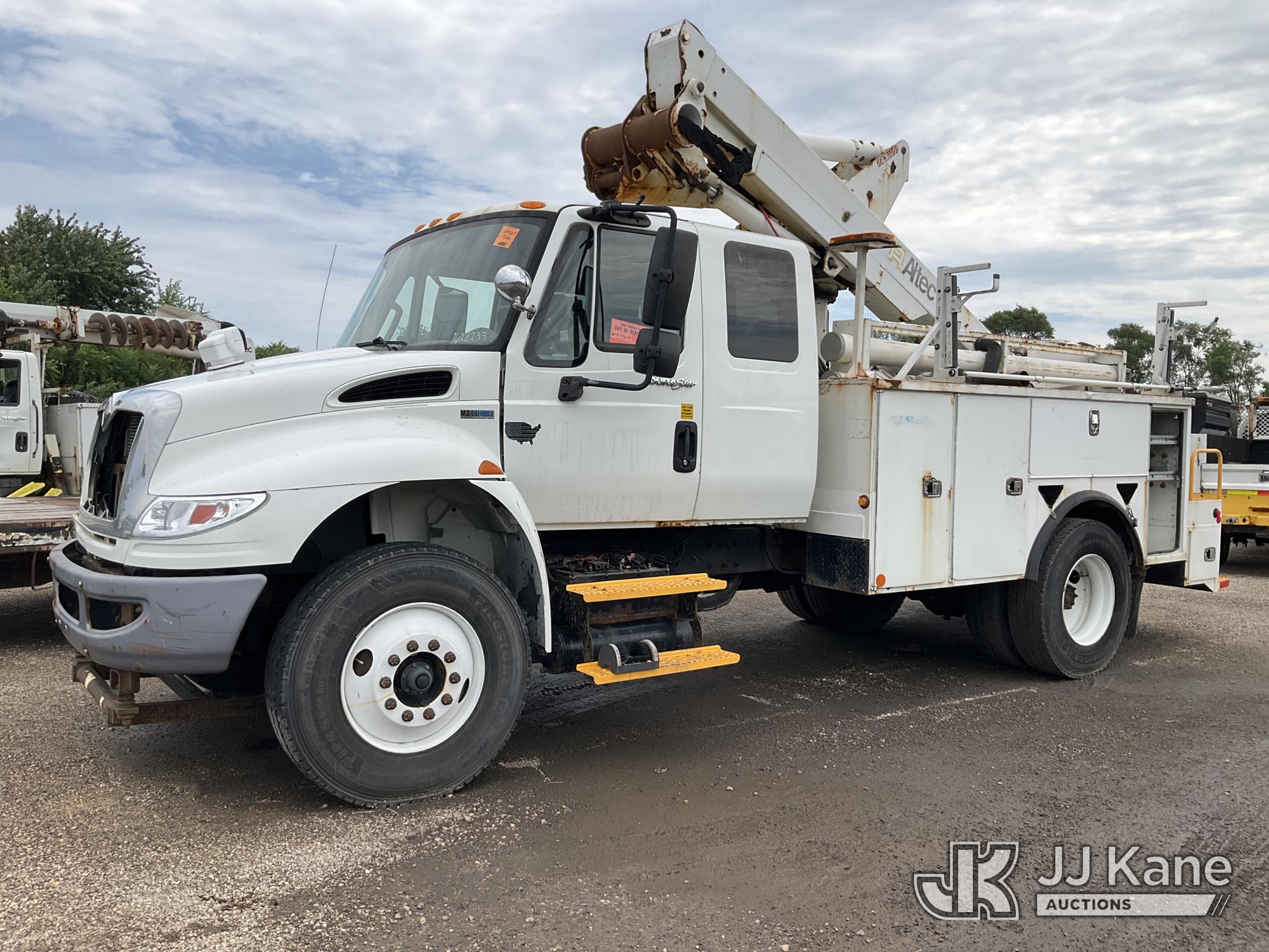 Altec TA40, Articulating & Telescopic Bucket Truck mounted behind cab on 2012 International DuraStar 4300 Utility Truck