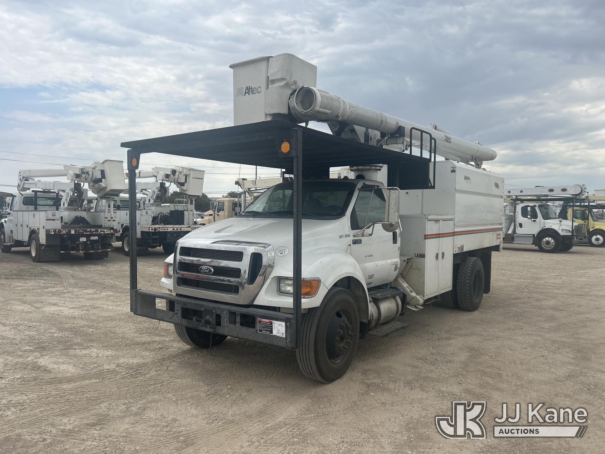 Altec LR756, Over-Center Bucket Truck mounted behind cab on 2013 Ford F-750 Chipper Dump Truck