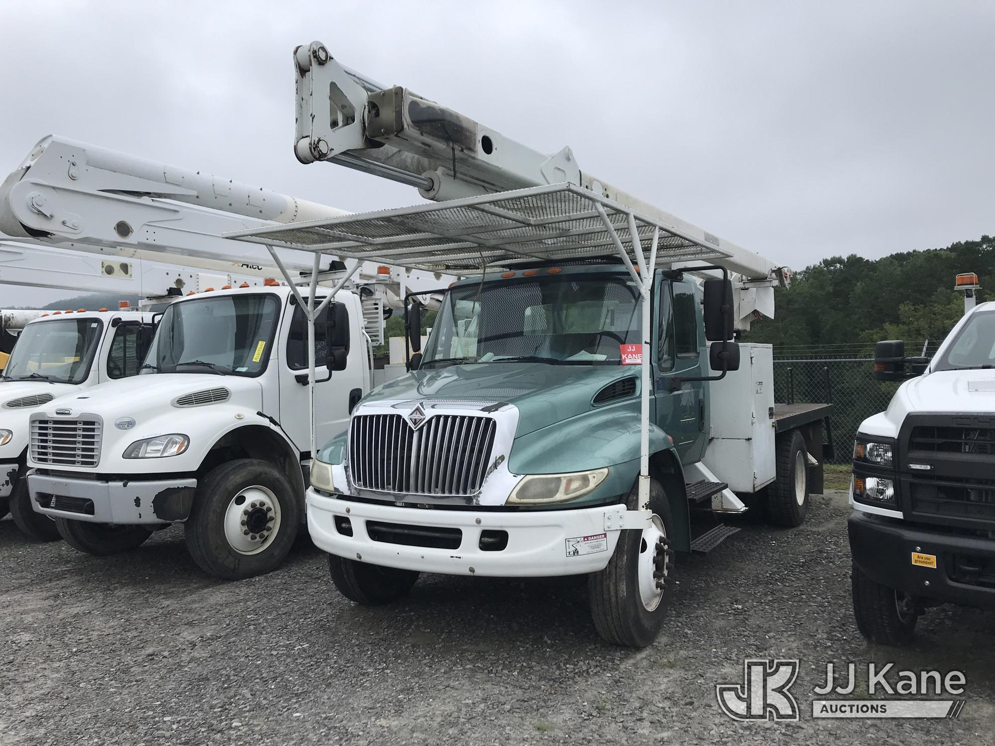 Terex XT60RM, Over-Center Bucket Truck rear mounted on 2004 International 4300 Flatbed Truck