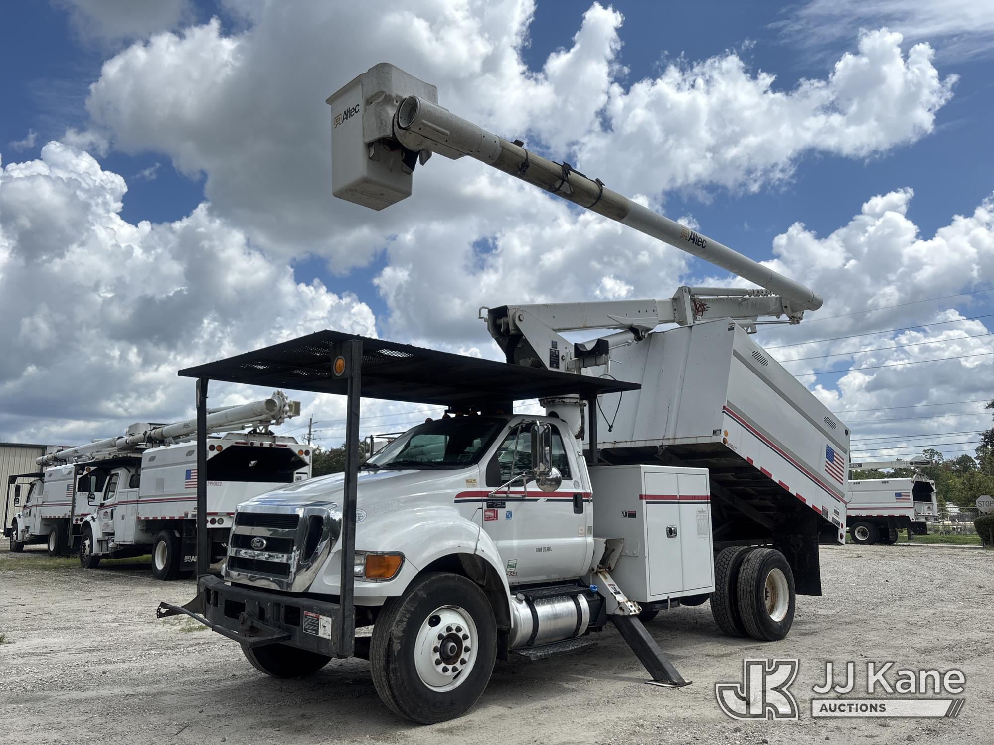 Altec LR756, Over-Center Bucket Truck mounted behind cab on 2015 Ford F-750 Chipper Dump Truck