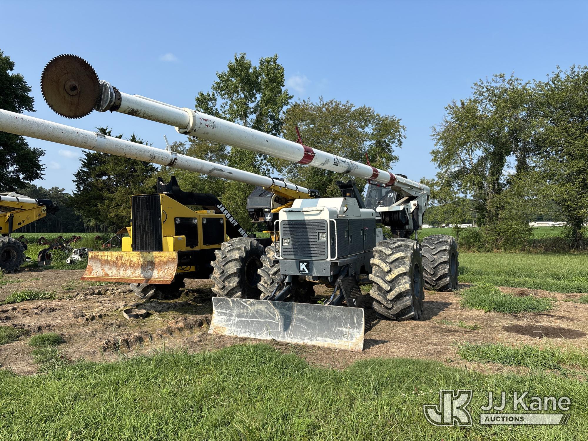 Kershaw Sky Trim 75G3, Telescopic Insulated Tree Saw mounted on Kershaw Articulating Rubber Tired Log Skidder