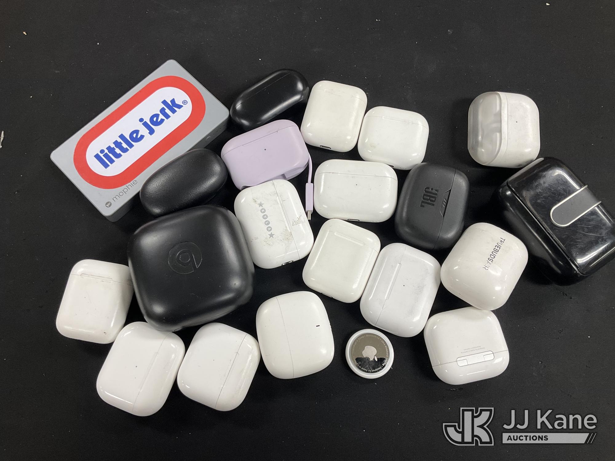 Earbuds and Empty Charging Cases