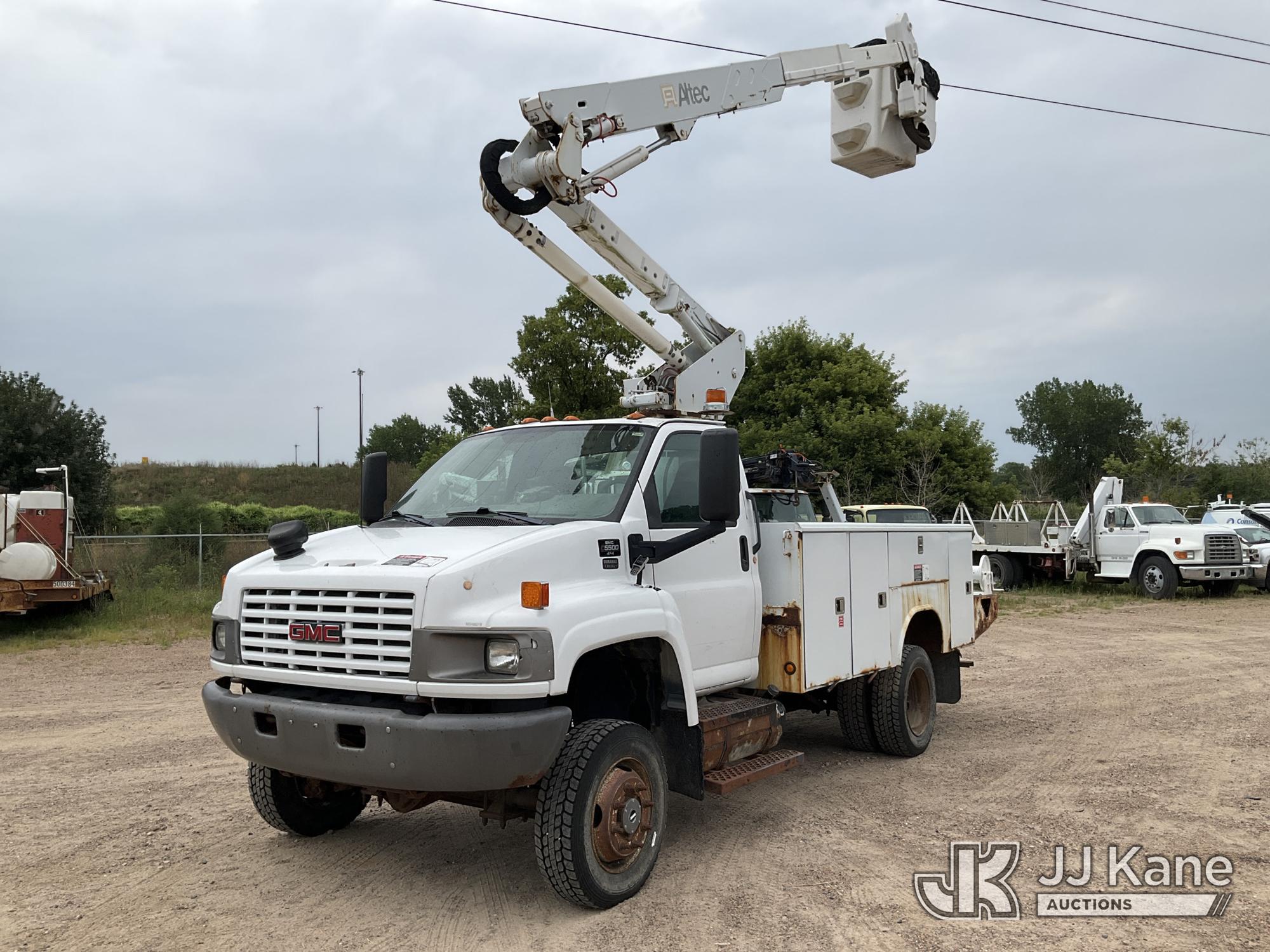 Altec AT37G, Articulating & Telescopic Bucket Truck mounted behind cab on 2009 GMC C5500 Utility Truck