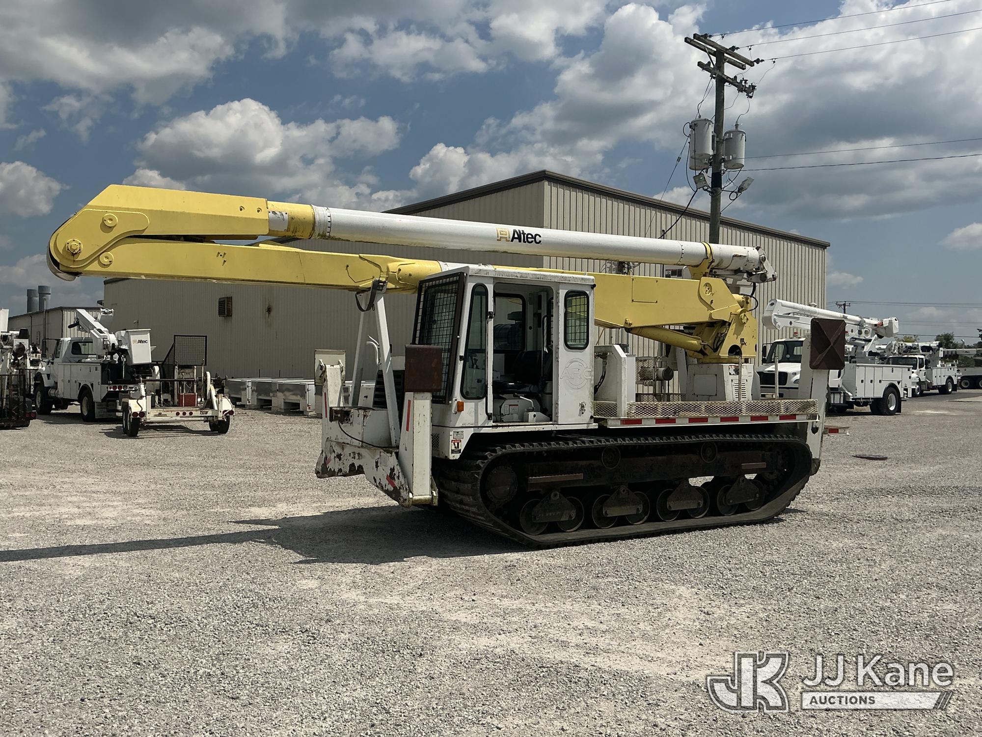 Altec AA755L, Material Handling Bucket rear mounted on 2000 IHI IC70-2 All-Terrain Track Machine