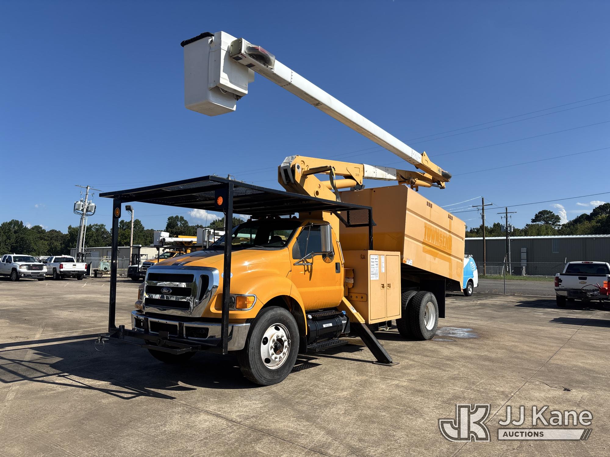Terex/HiRanger XT55, Over-Center Bucket Truck mounted behind cab on 2013 Ford F-750 Chipper Dump Truck