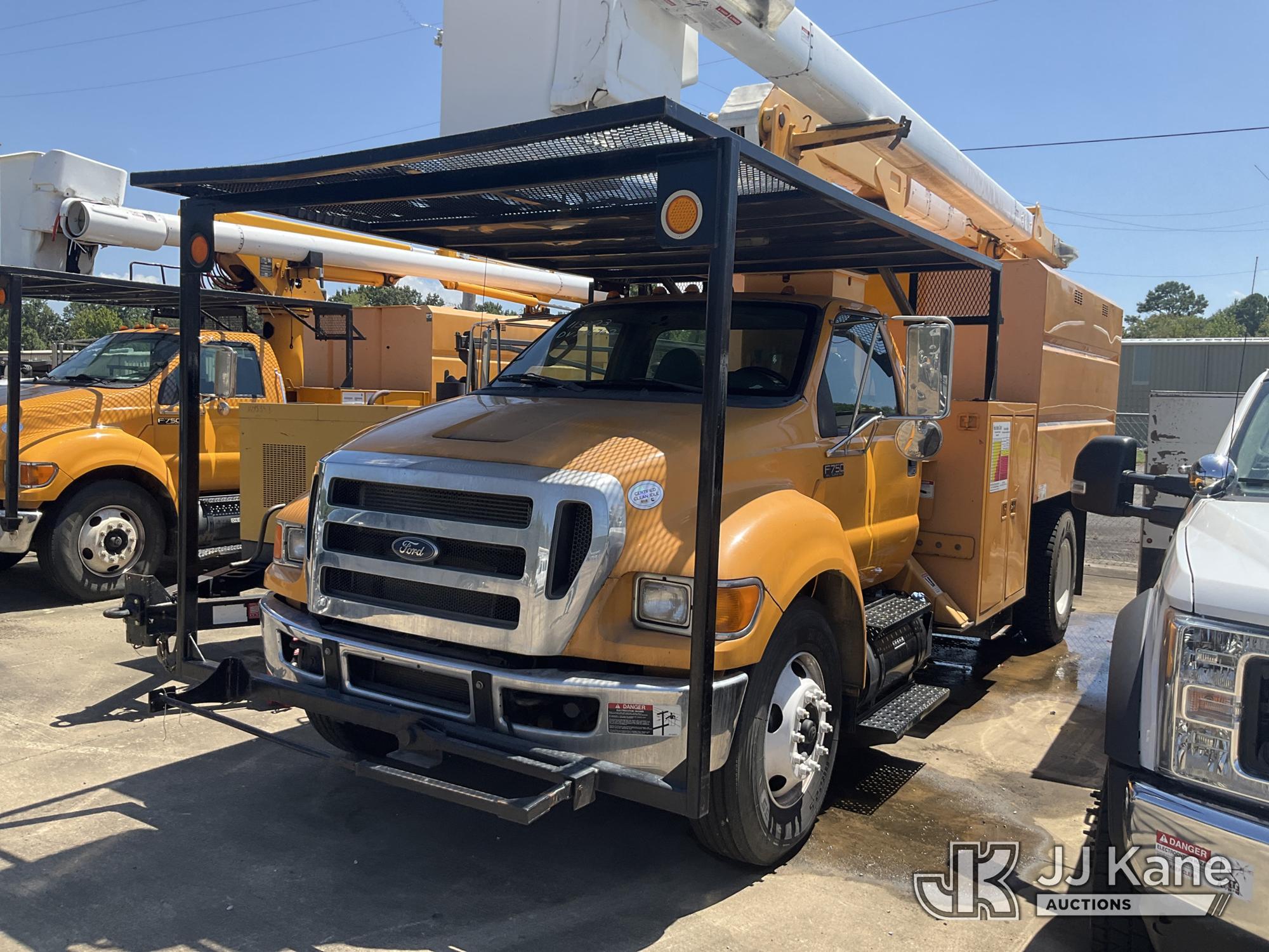 HiRanger XT-55, Over-Center Bucket Truck mounted behind cab on 2013 Ford F-750 Chipper Dump Truck