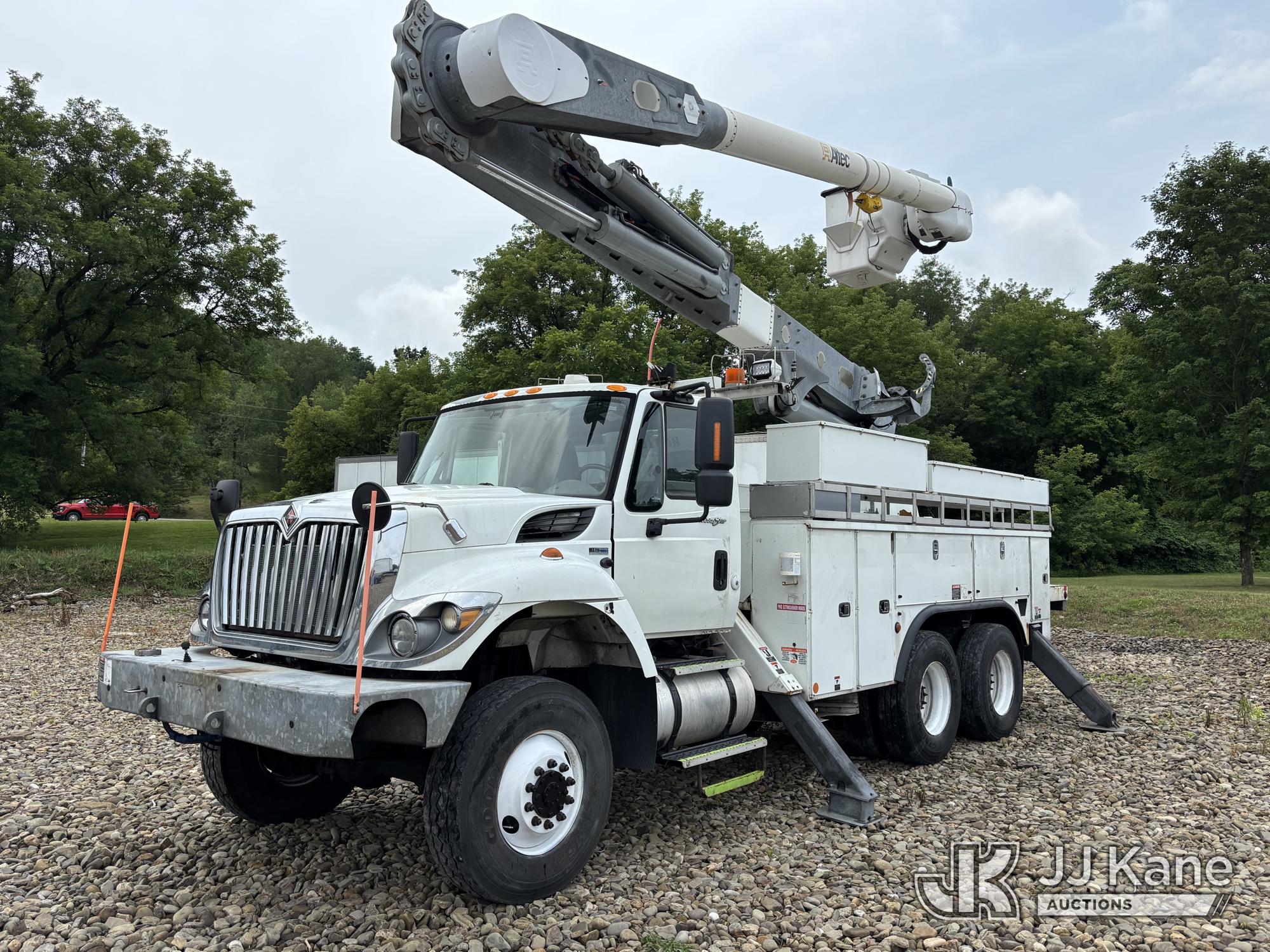 Altec AM55E, Over-Center Material Handling Bucket Truck rear mounted on 2013 International 7400 Utility Truck