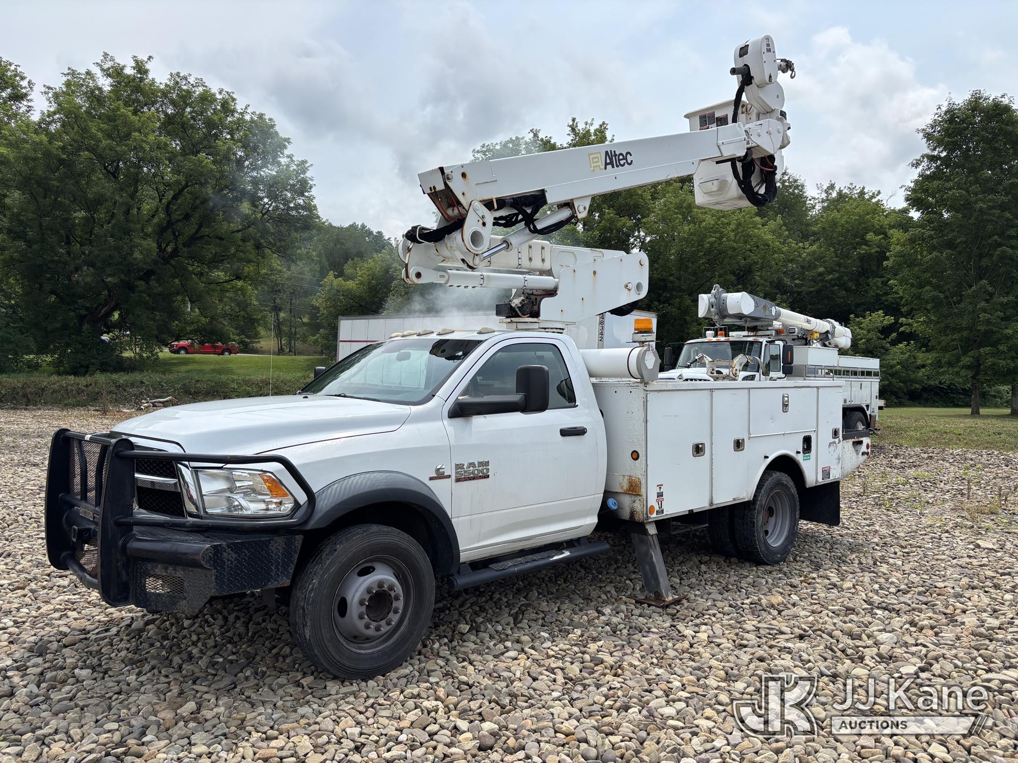 Altec AT40M, Articulating & Telescopic Material Handling Bucket Truck mounted behind cab on 2014 RAM 5500 Regular Cab Service Truck