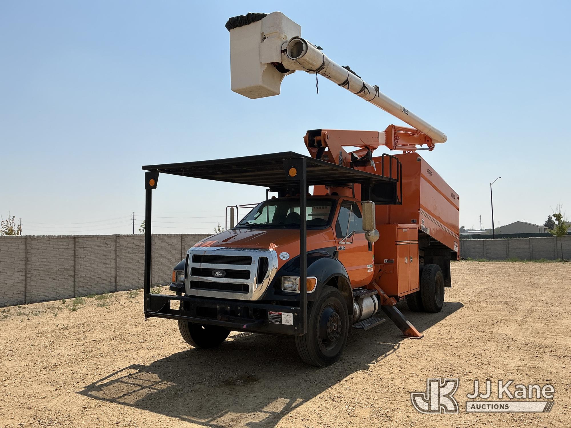 Altec LR756, Over-Center Bucket Truck mounted behind cab on 2015 Ford F-750 Chipper Dump Truck