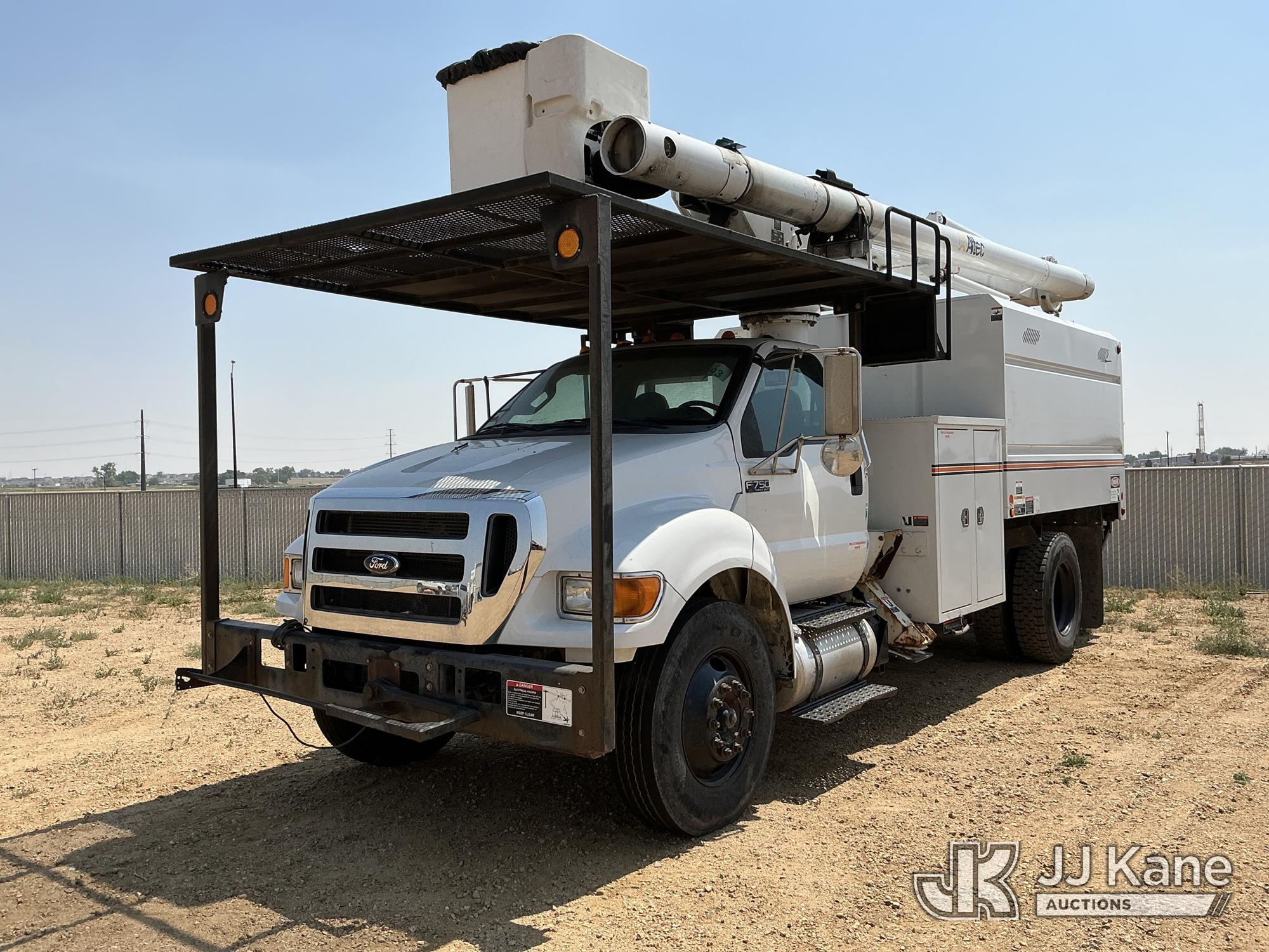 Altec LR756, Over-Center Bucket Truck mounted behind cab on 2015 Ford F-750 Chipper Dump Truck