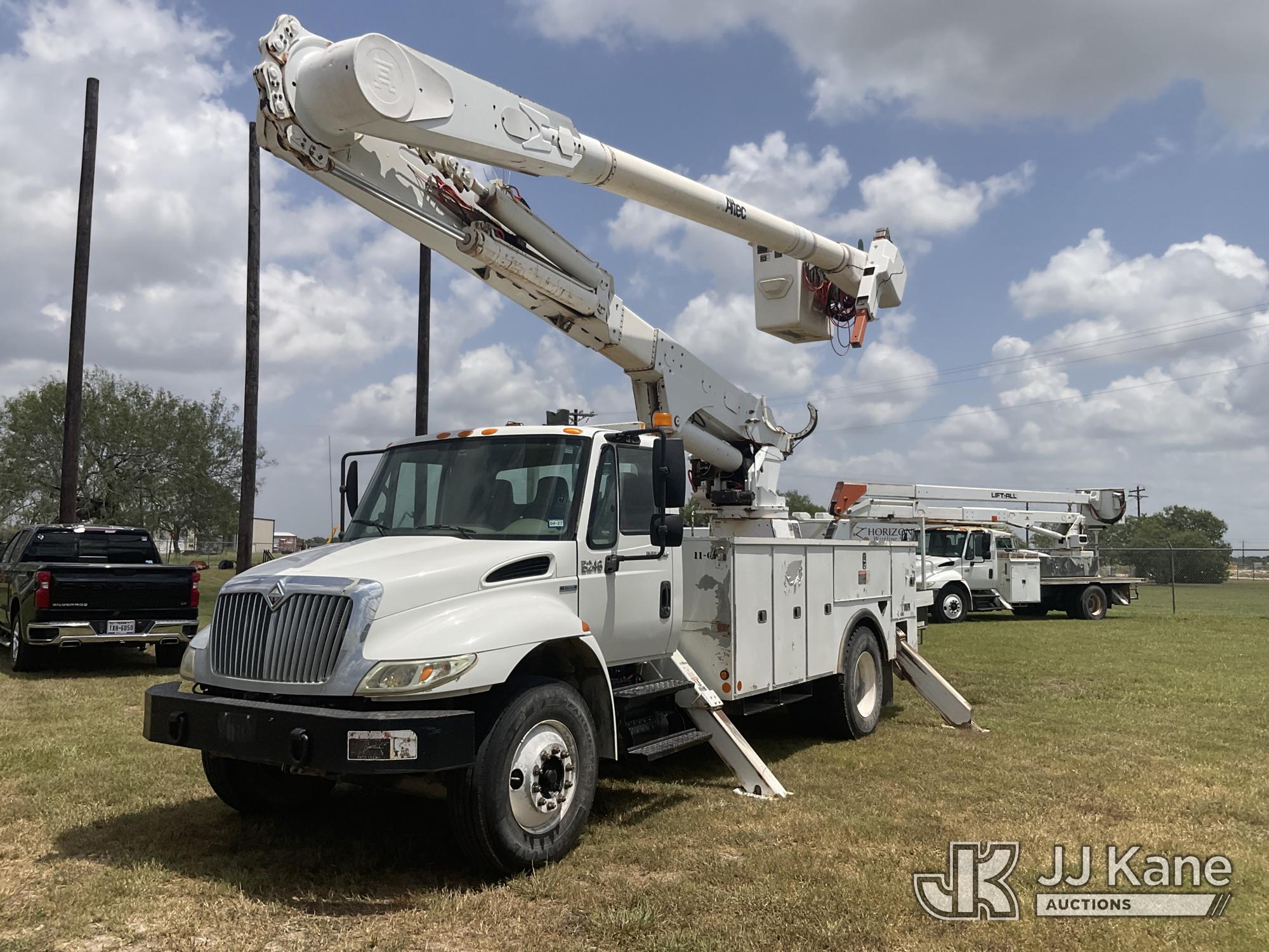 Altec AM55-E, Over-Center Material Handling Bucket Truck rear mounted on 2009 International 4300 Utility Truck