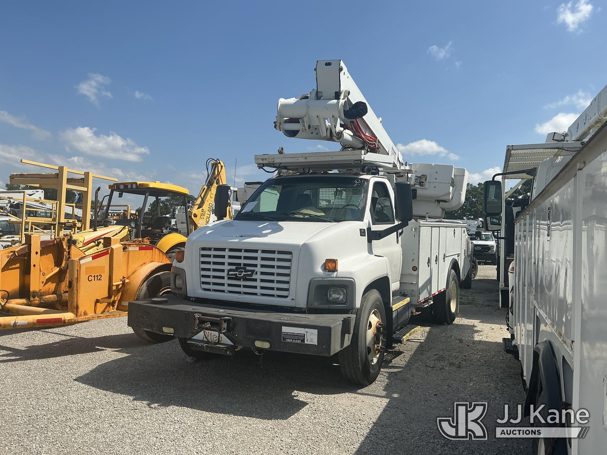 Altec TA45M, Articulating & Telescopic Material Handling Bucket Truck mounted behind cab on 2007 Chevrolet C7500 Utility Truck
